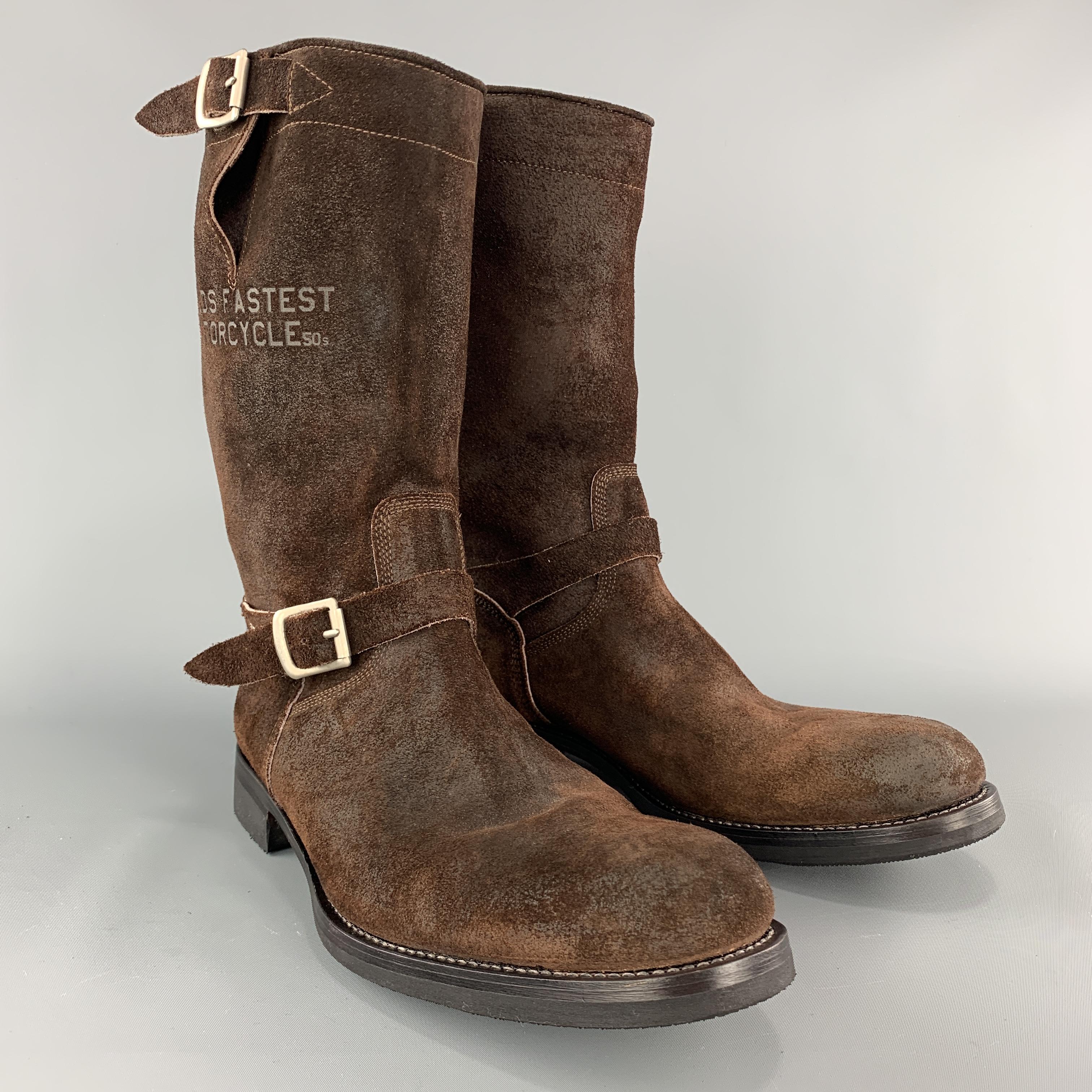 TRIUMPH X PAUL SMITH biker style boots come in distressed brown suede with embossing, ankle stripe and rubber sole. Made in Italy.

New with Box. Pre-Owned Condition.
Marked: UK 9.5

Outsole: 12.5 x 4.5 in.
Length: 12 in.