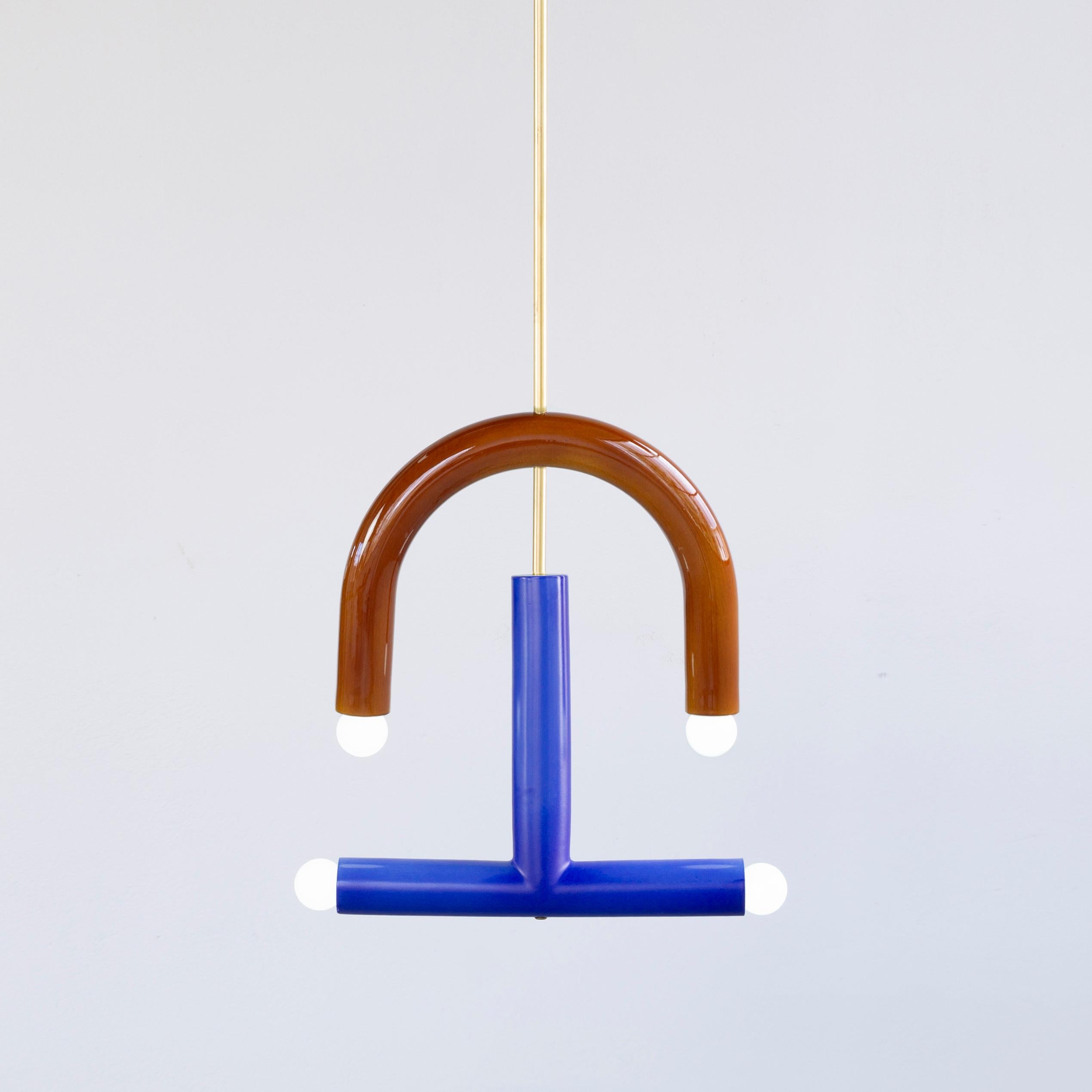 TRN C3 pendant lamp II by Pani Jurek
Dimensions: D 5 x W 35 x H 40 cm 
Material: Hand glazed ceramic and brass.
Available in other colors.
Lamps from the TRN collection hang on a metal tube, not on a cable. This allows the lamp to be mounted in a