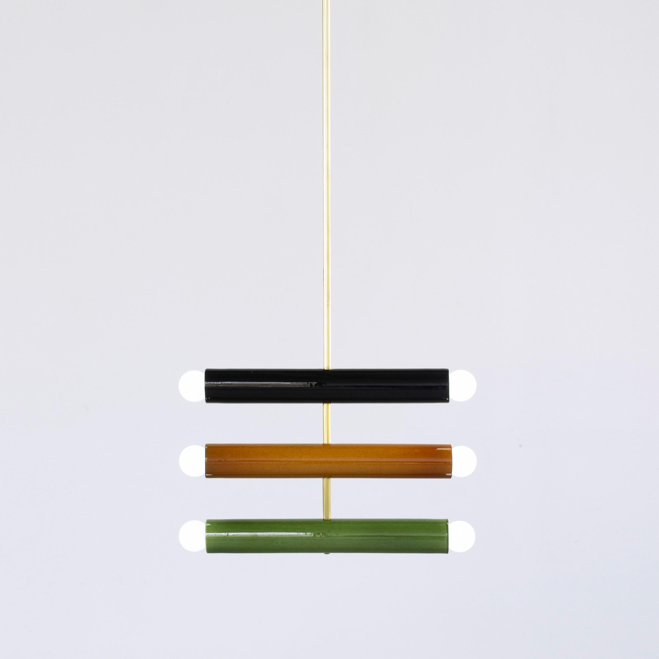TRN C4 pendant lamp by Pani Jurek
Dimensions: D 5 x W 35 x H 25 cm 
Material: Hand glazed ceramic and brass.
Lamps from the TRN collection hang on a metal tube, not on a cable. This allows the lamp to be mounted in a specific position. The length is