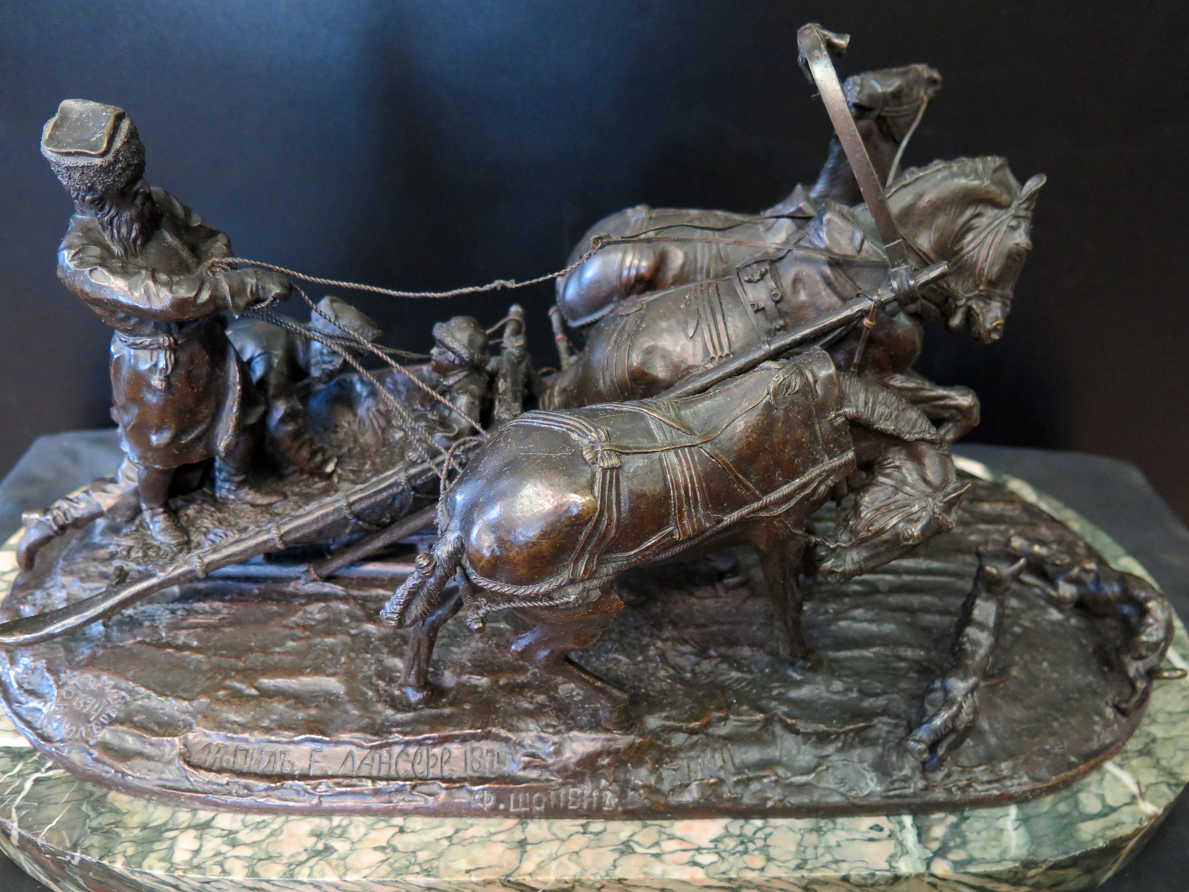 This vintage late 19th century Russian bronze, Troika, is created by Yeogeny Nickolayervich Lanceray.  The richly patinated bronze sculpture identifies three harnessed horses pulling a snow sled with three passengers. The bronze sculpture is