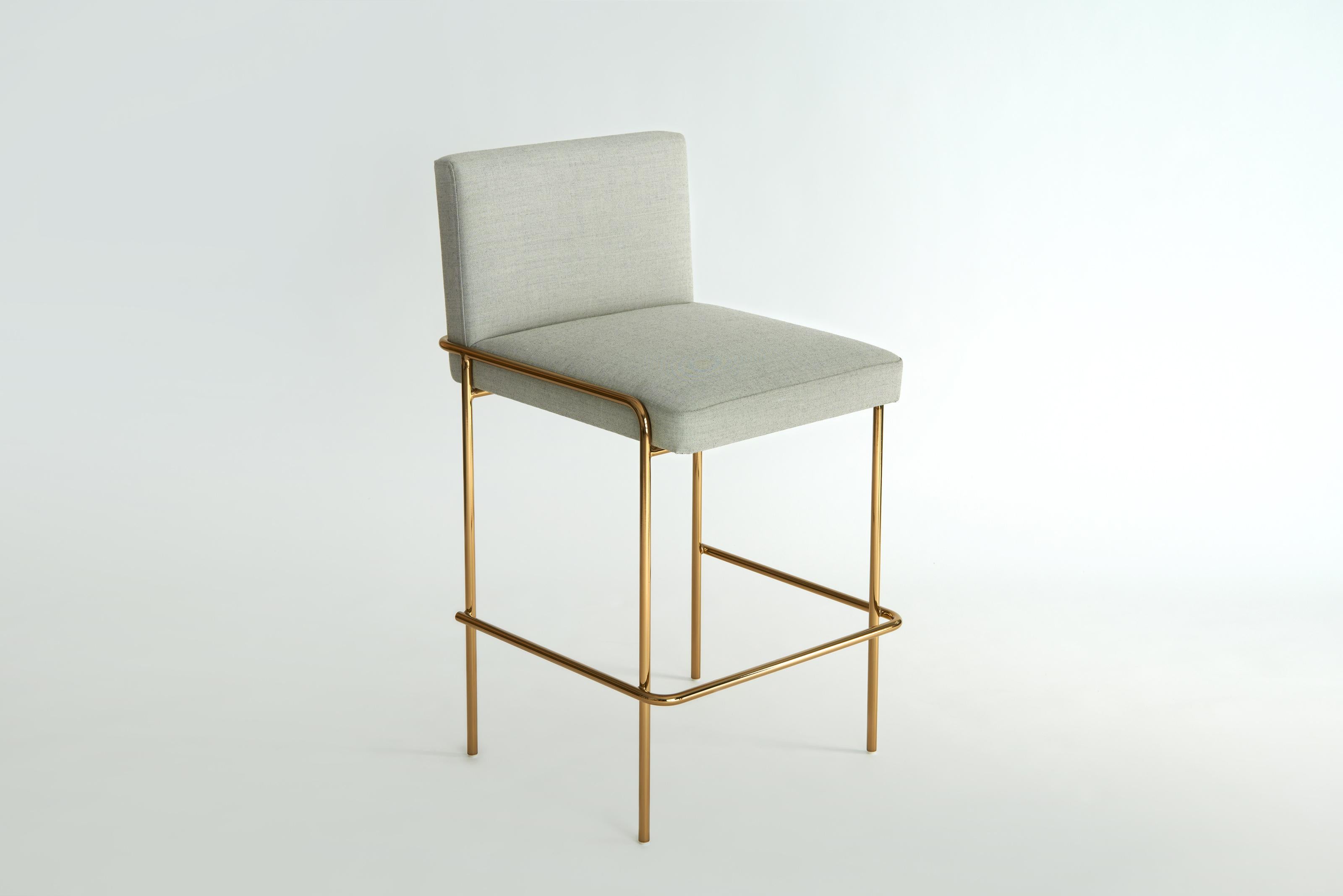 Trolley Counter Stool by Phase Design
Dimensions: D 54 x W 52.1 x H 88.9 cm. Seat Height: 63.5 cm.
Materials: Upholstery and smoked brass. 

Solid steel bar available in a smoked brass, polished chrome, burnt copper, or powder coat finish with