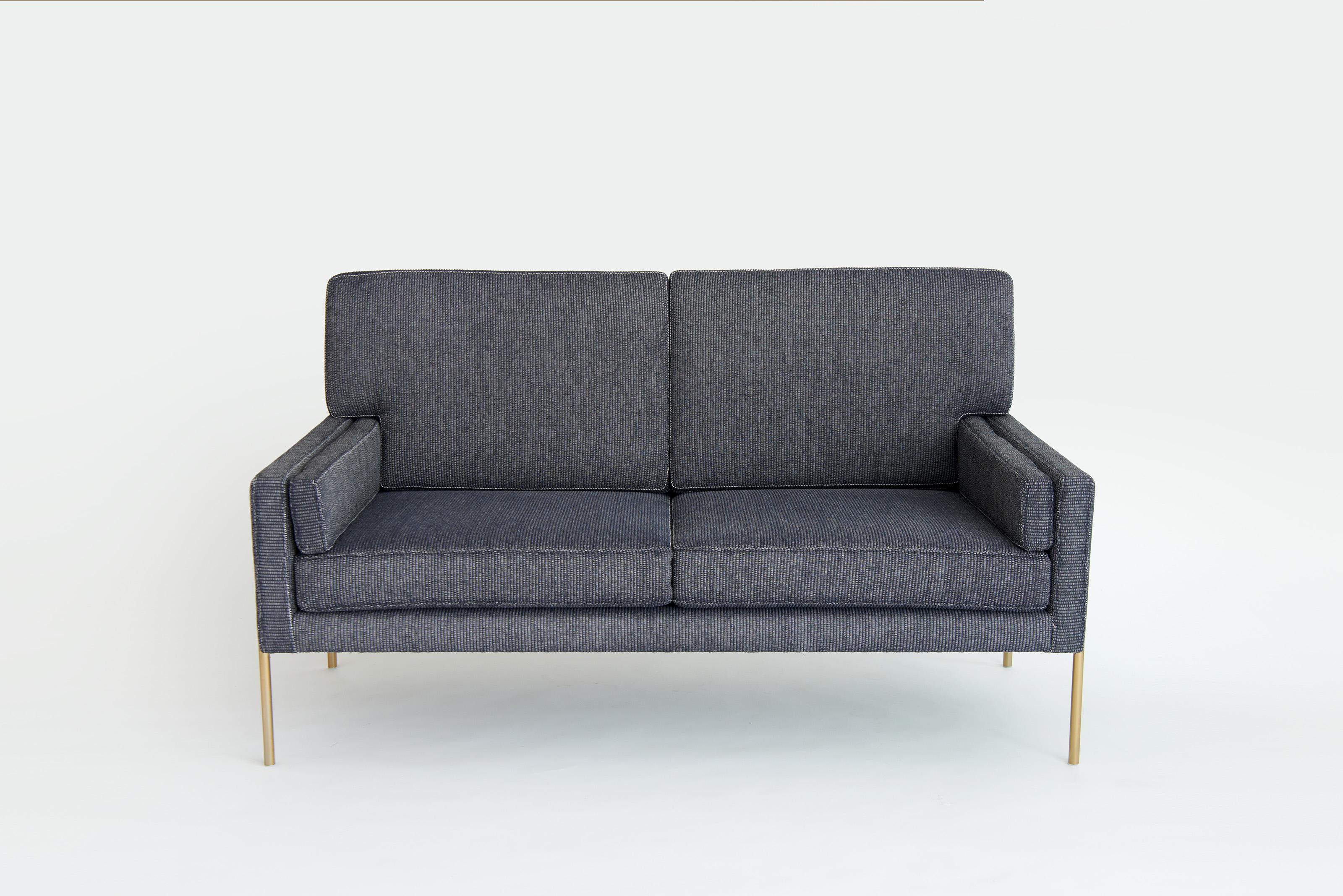 Trolley Love Seat by Phase Design
Dimensions: D 77.5 x W 146.7 x H 81.3 cm. 
Materials: Upholstery and smoked brass.

Solid steel bar available in a smoked brass, polished chrome, burnt copper, or powder coat finish with upholstered top. Powder coat