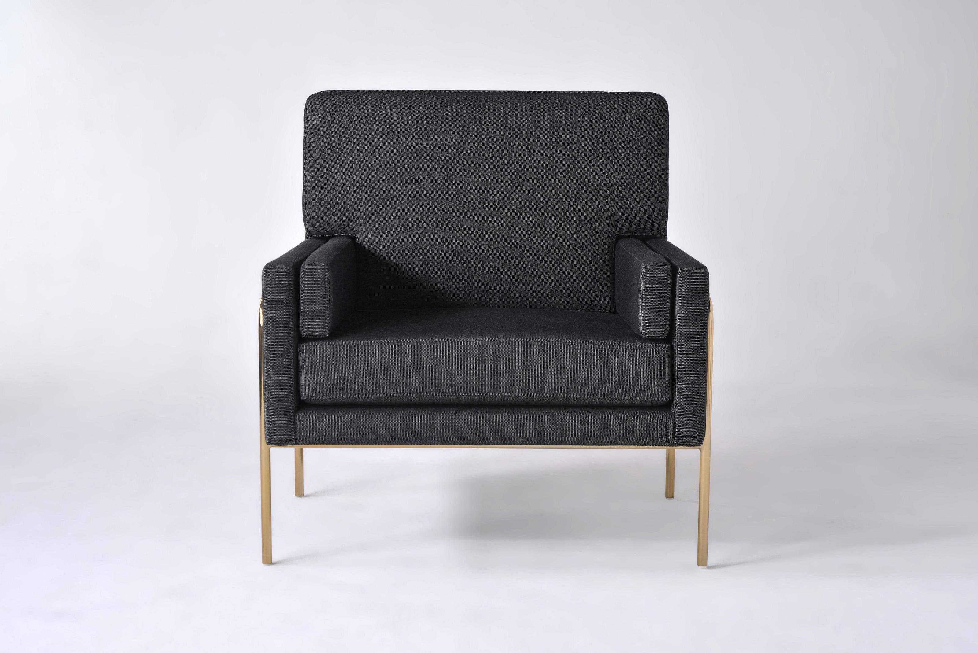 Trolley Low Back Lounge Chair by Phase Design
Dimensions: D 77.5 x W 80.6 x H 81.3 cm. 
Materials: Upholstery and smoked brass.

Solid steel bar available in a smoked brass, polished chrome, burnt copper, or powder coat finish with an upholstered