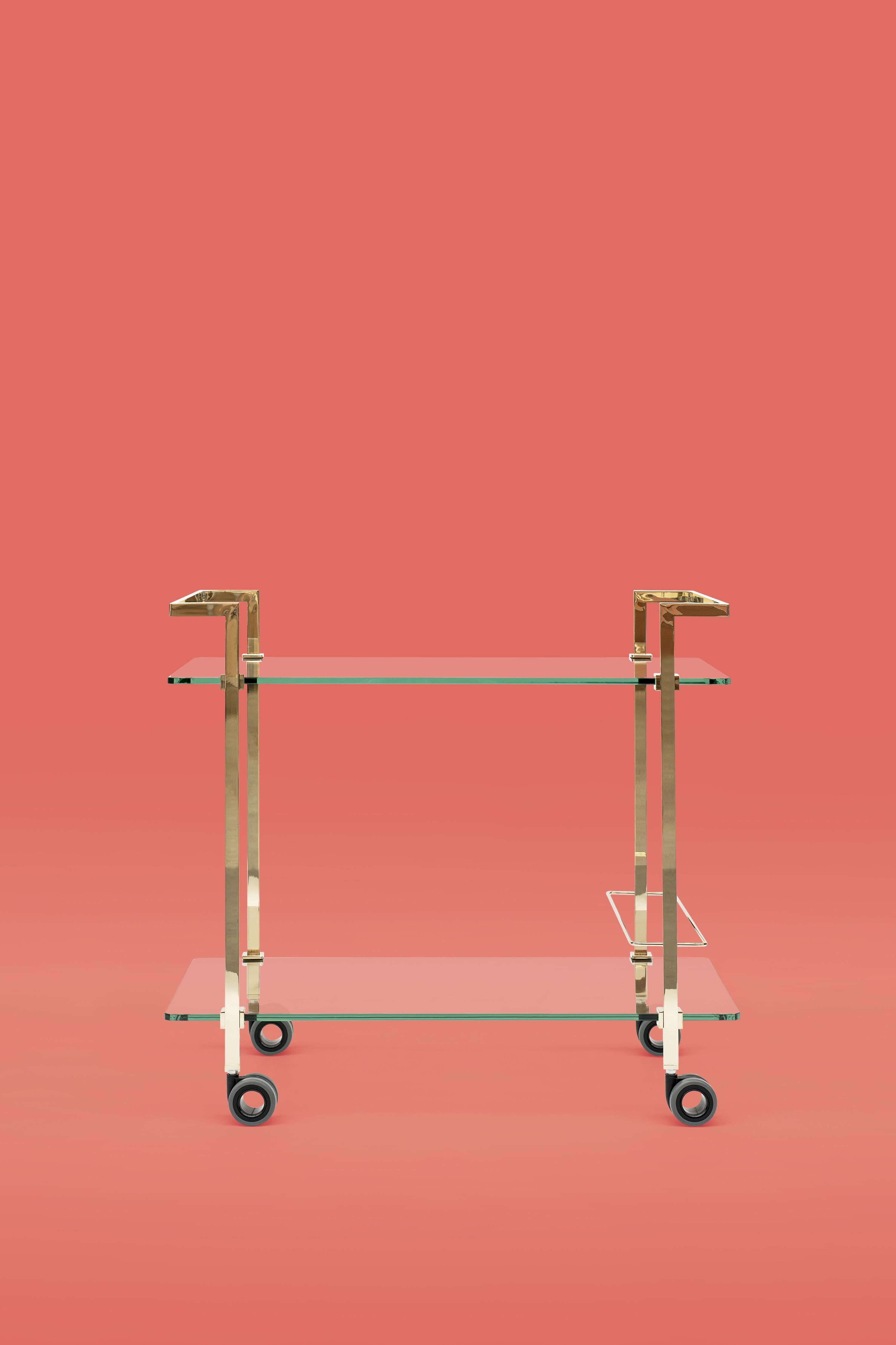 This Hollywood regency style Doris T63S trolley was designed by Peter Ghyczy in 1990 and hand-crafted in the GHYCZY atelier in the South of the Netherlands. The Doris T63S trolley features a polished brass glossed frame, which is casted in two