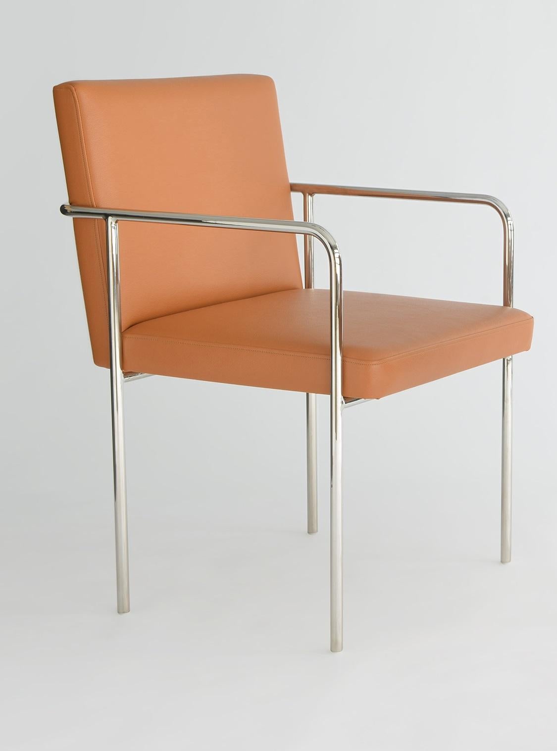 Trolley Side Chair With Arms by Phase Design
Dimensions: D 59.7 x W 55.2 x H 81.3 cm. 
Materials: Leather and polished chrome.

Solid steel bar available in a smoked brass, polished chrome, burnt copper, or powder coat finish with upholstered top.