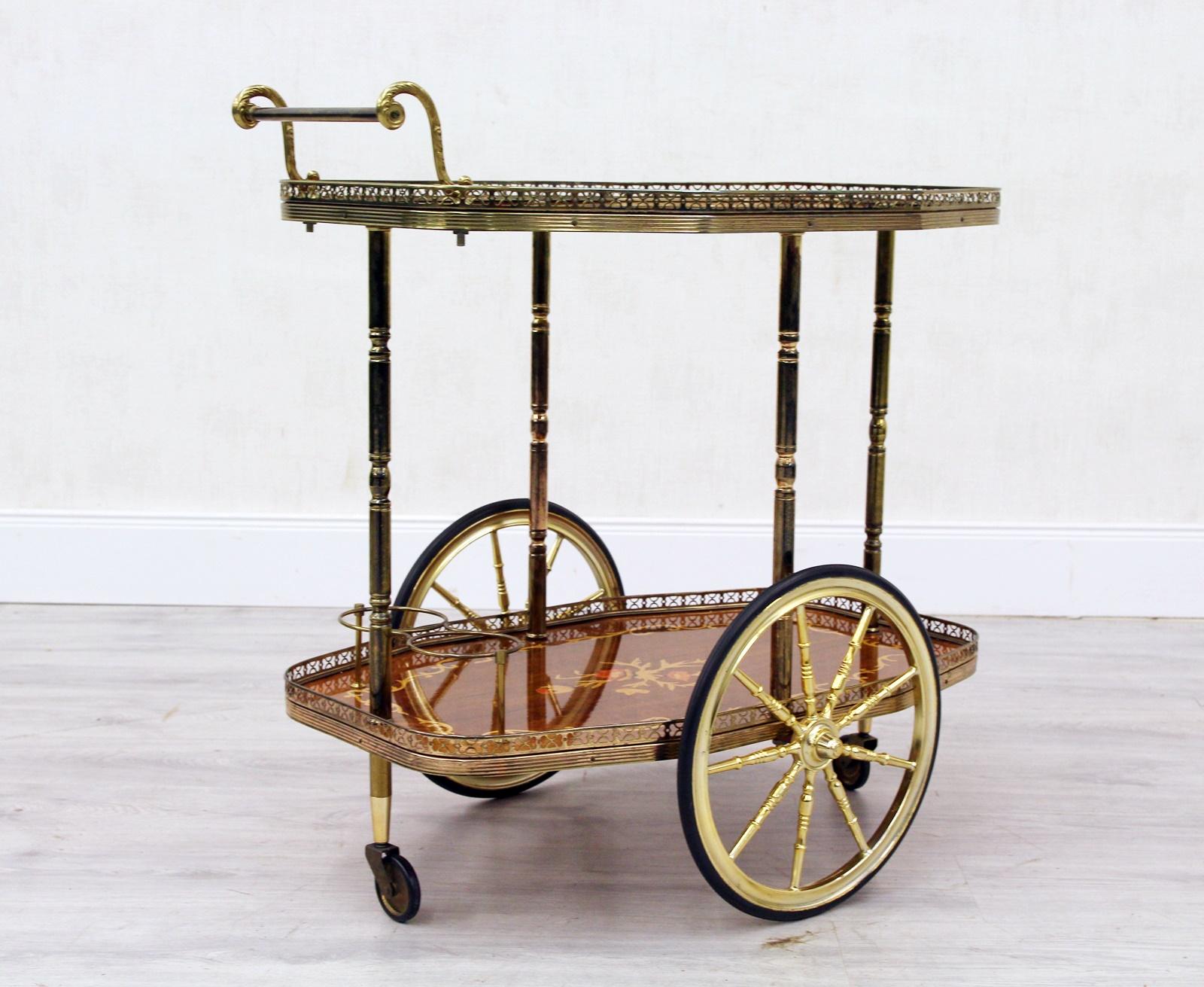 Gorgeous Teewagen

For sales is a beautiful exclusive tea car with great Intarsia
Dimensions:
Height 66cm, width 73cm, depth 45cm

- Normal age-related use tracks, see photos
- With great Intarsia
- Processed with brass
- Super total