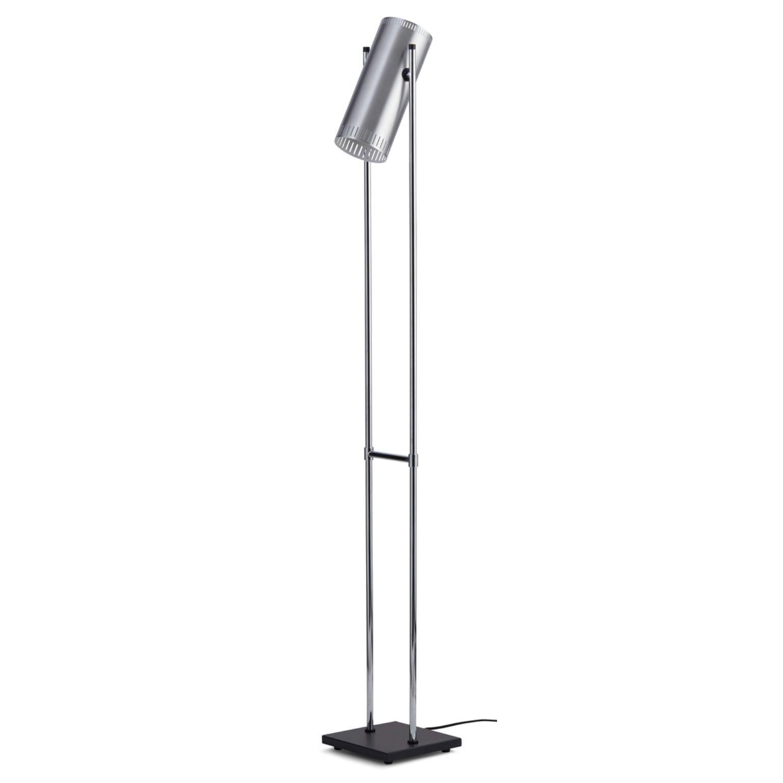 Trombone aluminium floor lamp by Warm Nordic
Dimensions: D20 x W18 x H136 cm
Material: Brushed aluminium
Weight: 2 kg
Also available in different finishes. 

Warm Nordic is an ambitious design brand anchored in Nordic design history and with a
