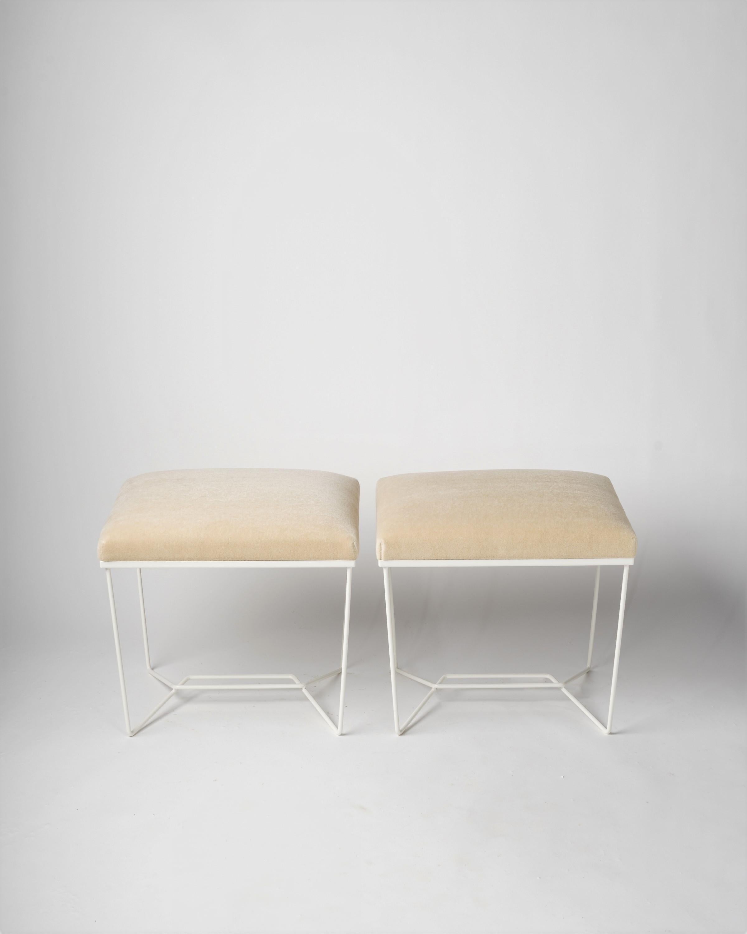 Trombone benches by Facto Atelier Paris, current production. Featured with a white enameled steel base with creme white Pierre Frey mohair upholstery, available now. 

Leg/base color and upholstery can be customized. 
