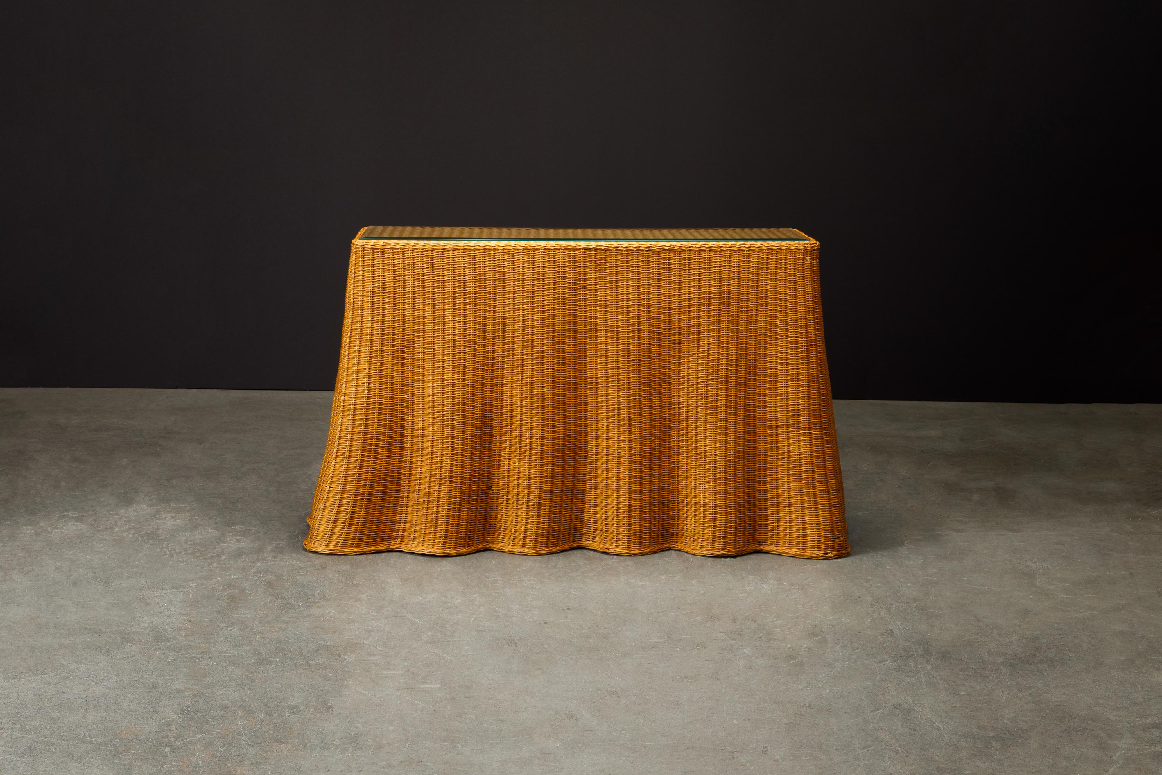 These vintage Trompe L'oeil 'Draped' wicker console tables are so in-demand by interior designers and collectors these days, making them increasingly hard to find on the open market. The spectacular illusion of fabric draped over a table - but