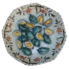 Piatto con piede in trompe l'oeil, Faenza, XVII secolo