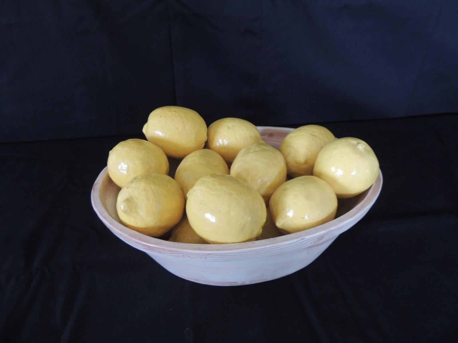 Trompe-L'oeil Lemons inside Faux Wooden porcelain Basket.
Italian yellow lemons inside basket (real lemon size)
Stamped: Italy
Size: 11