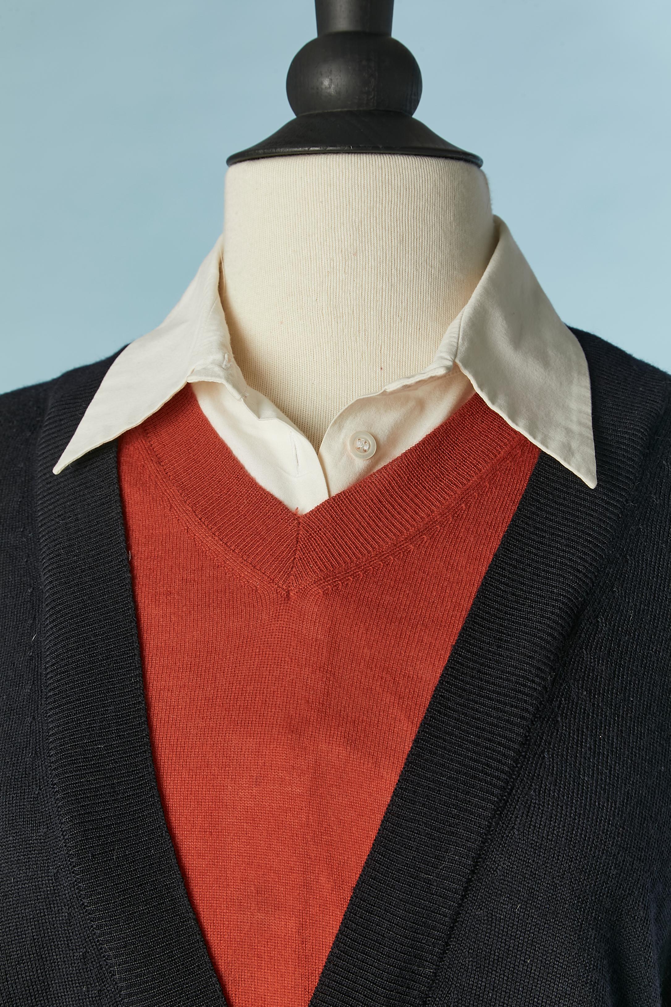 Trompe l'oeil oversize wool sweater with detachable cotton shirt collar. ( one sweater with 2 neckline overlay)
Oversize