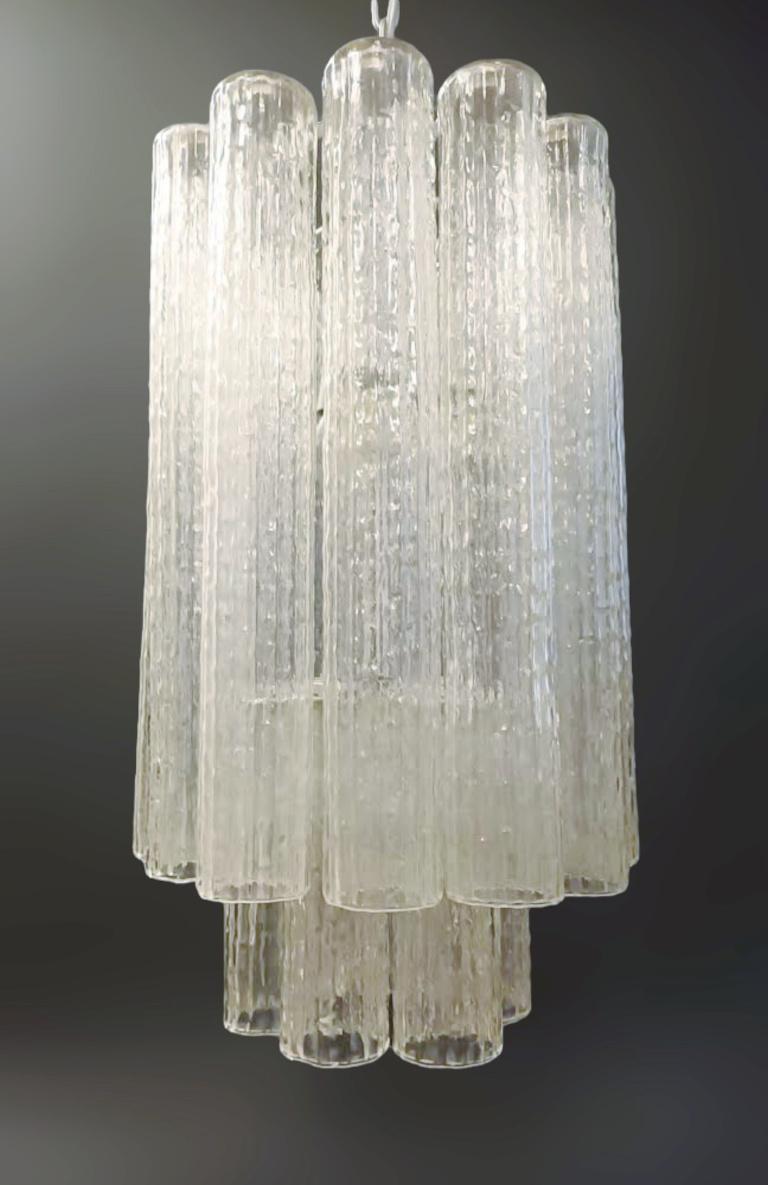 Vintage Italian chandelier or lantern with clear tree trunk shaped Murano glass tubes / Designed by Toni Zuccheri for Venini, made in Italy, circa 1960s
Measures: diameter 12 inches, height 21.5 inches plus chain and canopy
3 lights / E26 or E27