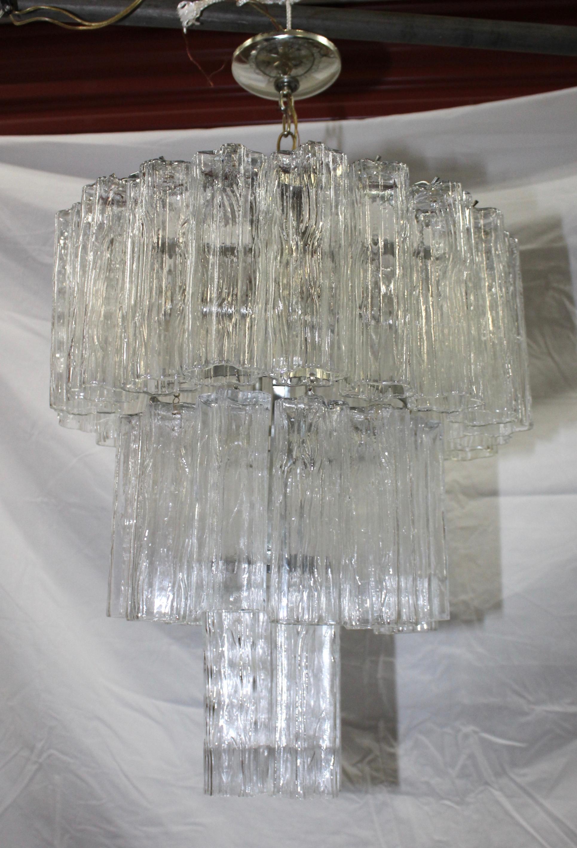 Stunning 1960s Mid-Century Modern tronchi Murano 3-tier chandelier with chrome frame.