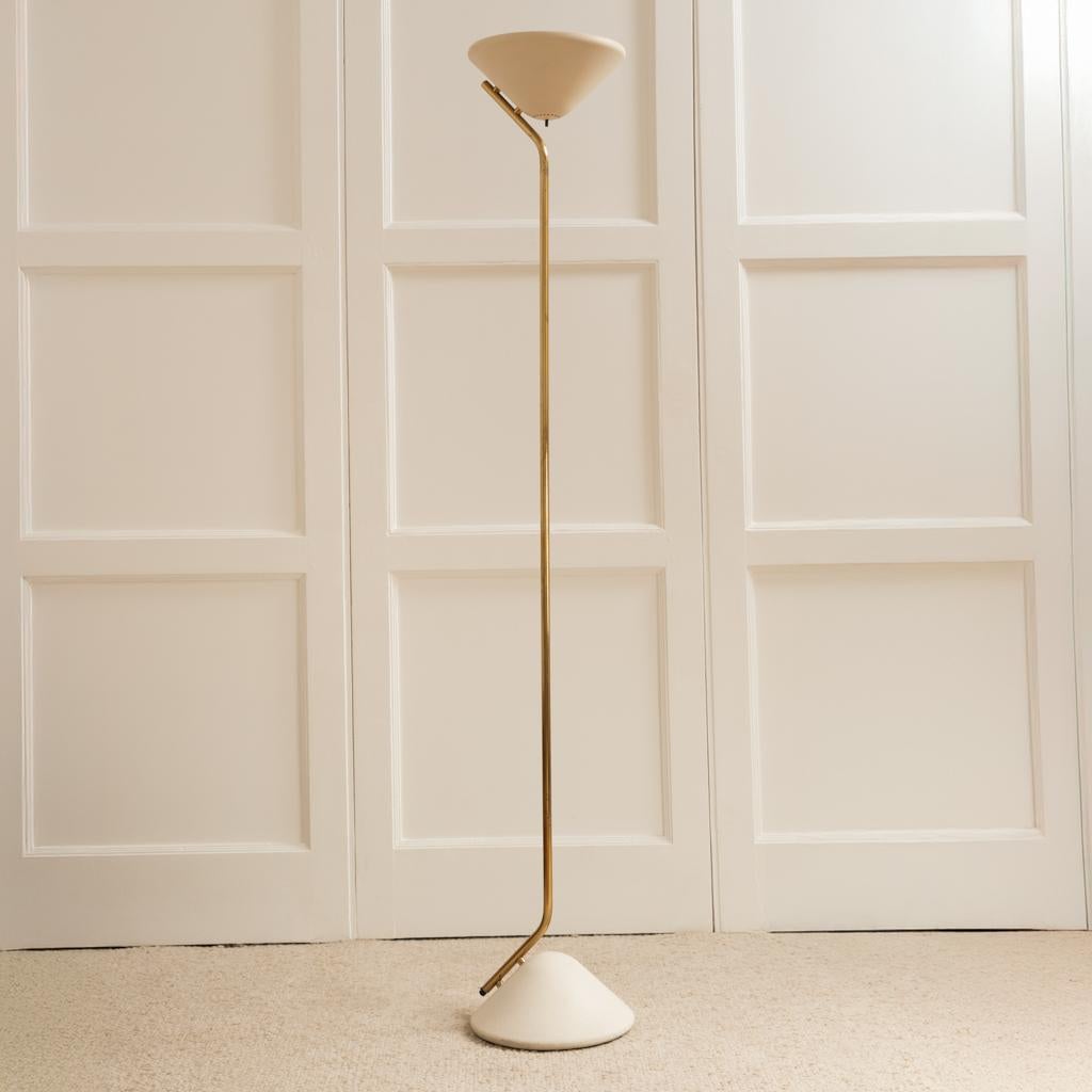 Enrico Tronconi Floor Lamp - Italy, 1960s

Brass stem with a patina of wear, on which two creamy white textured lacquered cones appear to hang at each end.

Updated electrical system with halogen bulb and dimmer.

Dimensions: H177 x D30 cm