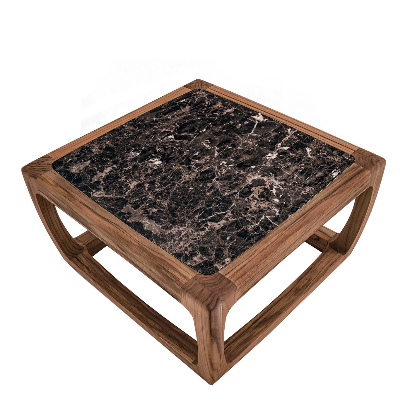 Coffee table trooper walnut with all structure in solid
walnut wood and with dark emperador polished marble
top. Treated wood with wax with natural pine extracts.
Also available in solid oak, on request.