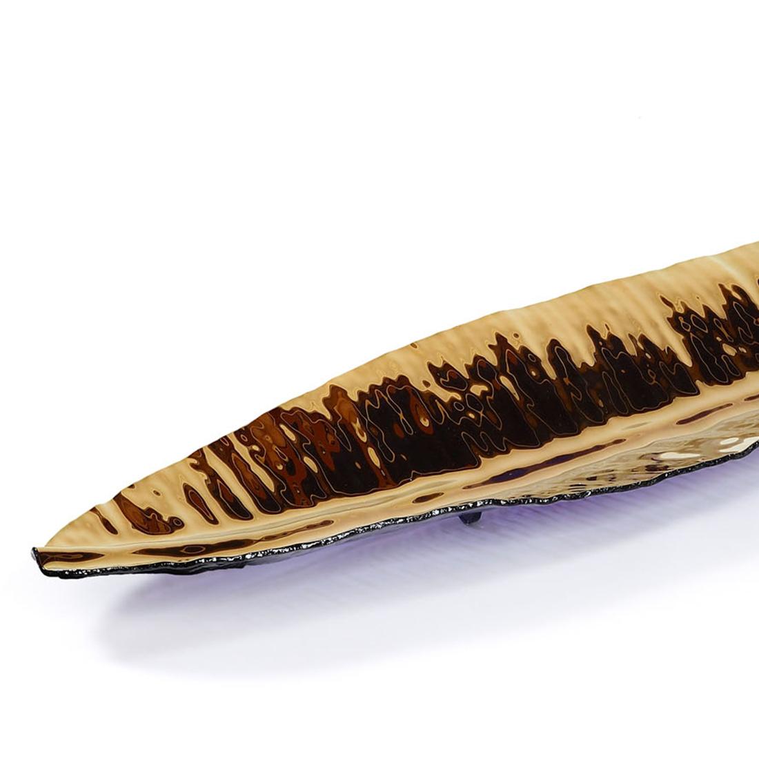 Ciotola Tropic Long Leave in vetro bronzato
con tutta la struttura in vetro con finitura bronzata.
