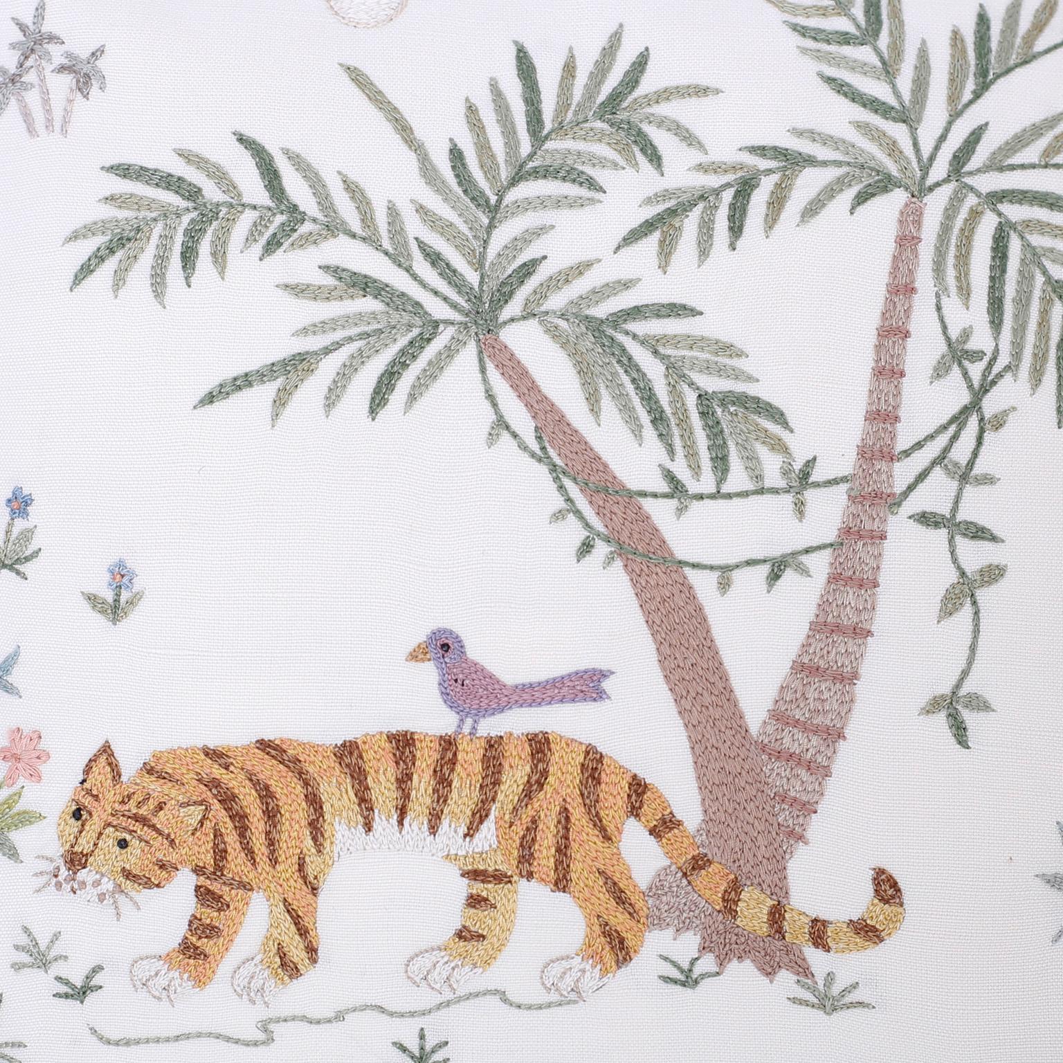 Linen pillow hand decorated with a tiger and a bird under a palm tree. Button back for easy care.