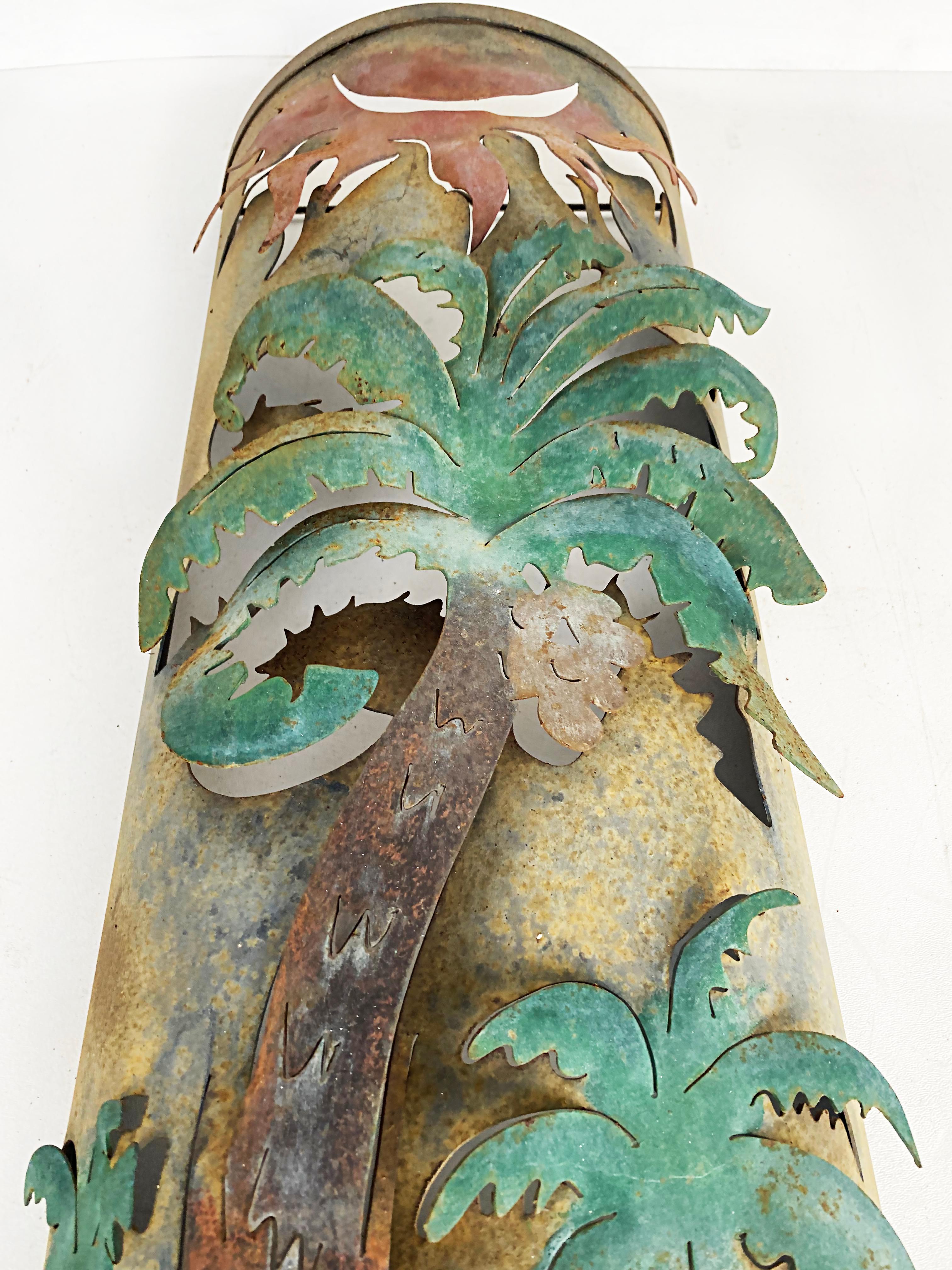 Tropical exterior metal painted palm tree wall sculpture.

Offered for sale is a tropical, outdoor mixed metal painted palm tree wall sculpture. This work is from an amazing Miami Beach island estate where this fun outdoor sculpture adorned an