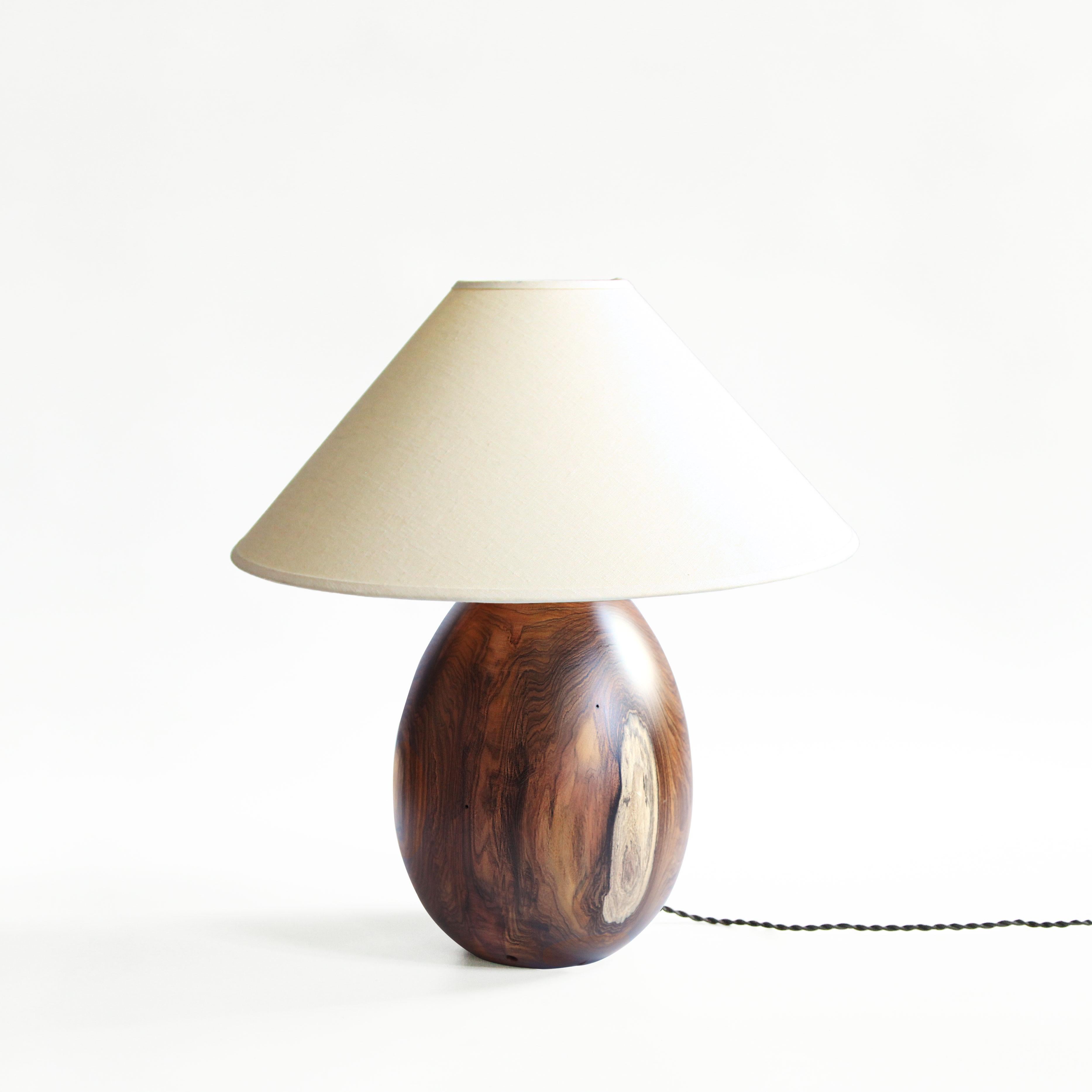 The Árbol collection is an embrace of tropical modernism; each lamp is composed of salvaged tropical hardwoods from the Bolivian city of Santa Cruz, where trees that are felled by natural causes, or for construction, are rescued by our team. A blend