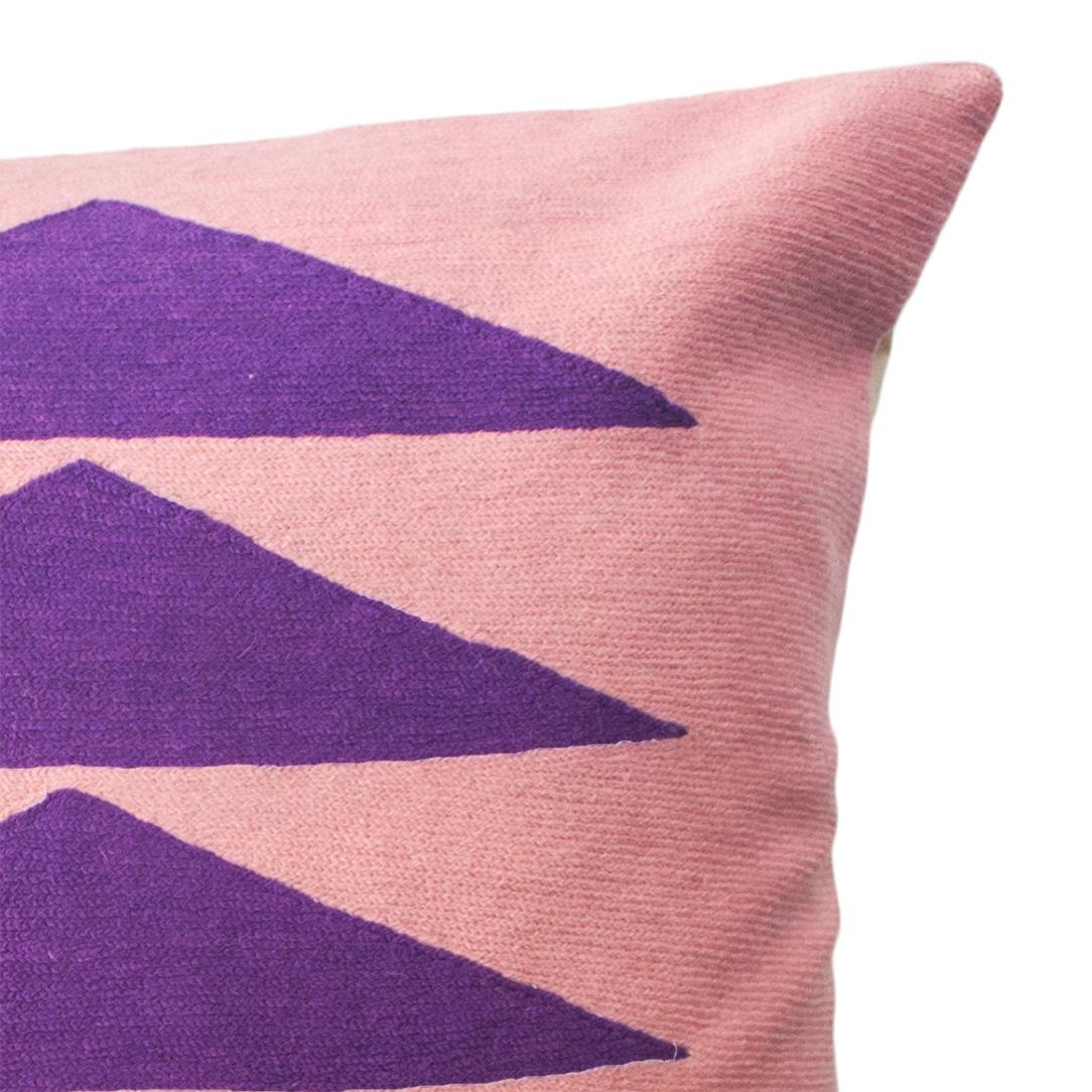 These geometric throw pillows have been ethically hand embroidered by artisans in Kashmir, India, using a traditional embroidery technique which is native to this region.

The purchase of this handcrafted pillow helps to support the artisans and