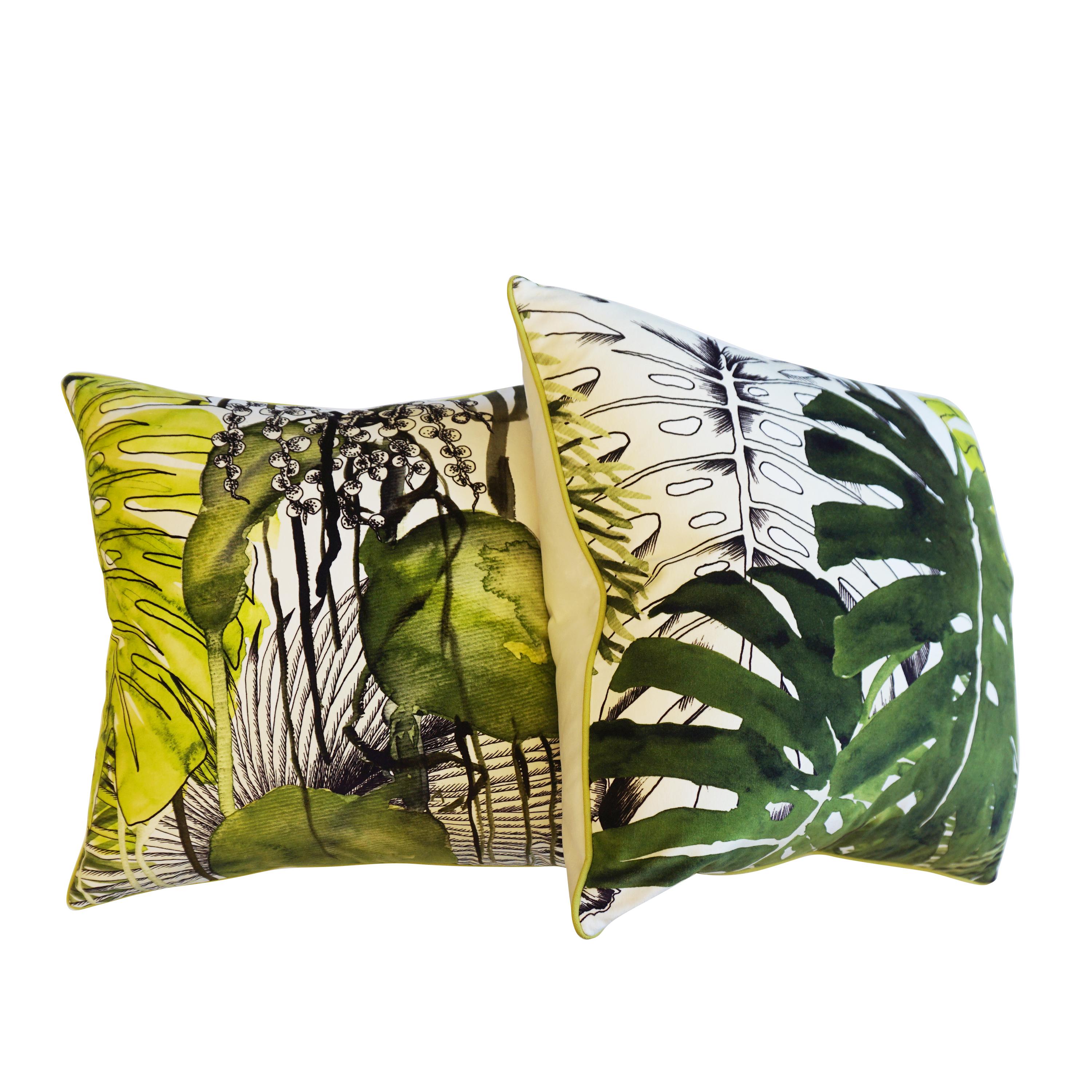 A pair of throw pillows hand sewn in palm tree Christian Lacroix fabric. Each pillow is accented with lime green piping and the back is white velvet. All pillows are hand sewn at our studio in Norwalk, CT.

Measurements

24” H x 24” W.