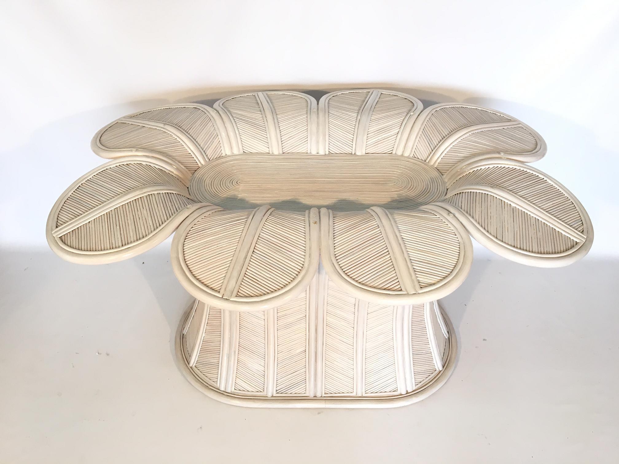 Large bell flower table base in pencil reed rattan in excellent vintage condition. Add your glass top for a beautiful vintage Florida statement piece.