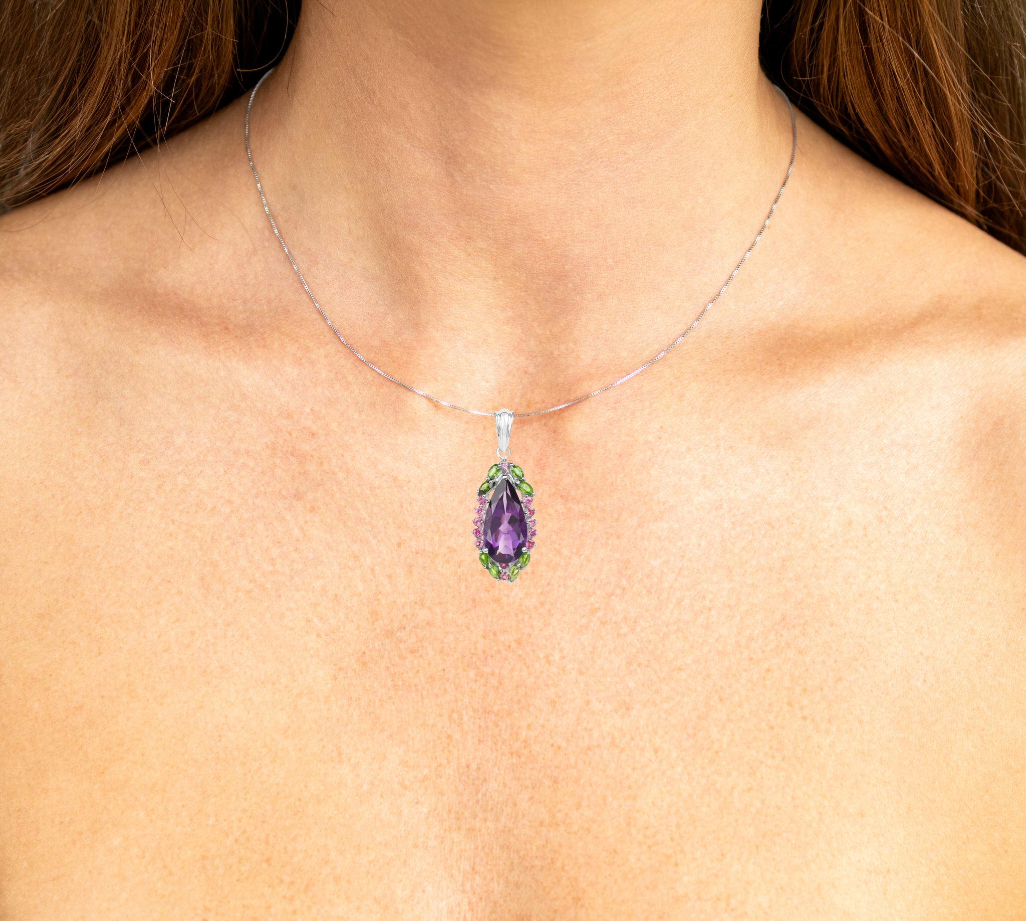 It comes with the Gemological Appraisal by GIA GG/AJP
All Gemstones are Natural
Amethyst = 5.00 Carats
13 Rhodolite Garnets = 0.62 Carats
8 Chrome Diopsides = 0.58 Carats
Metal: Rhodium Plated Sterling Silver
Pendant Dimensions: 38 x 15 mm
Jewelry