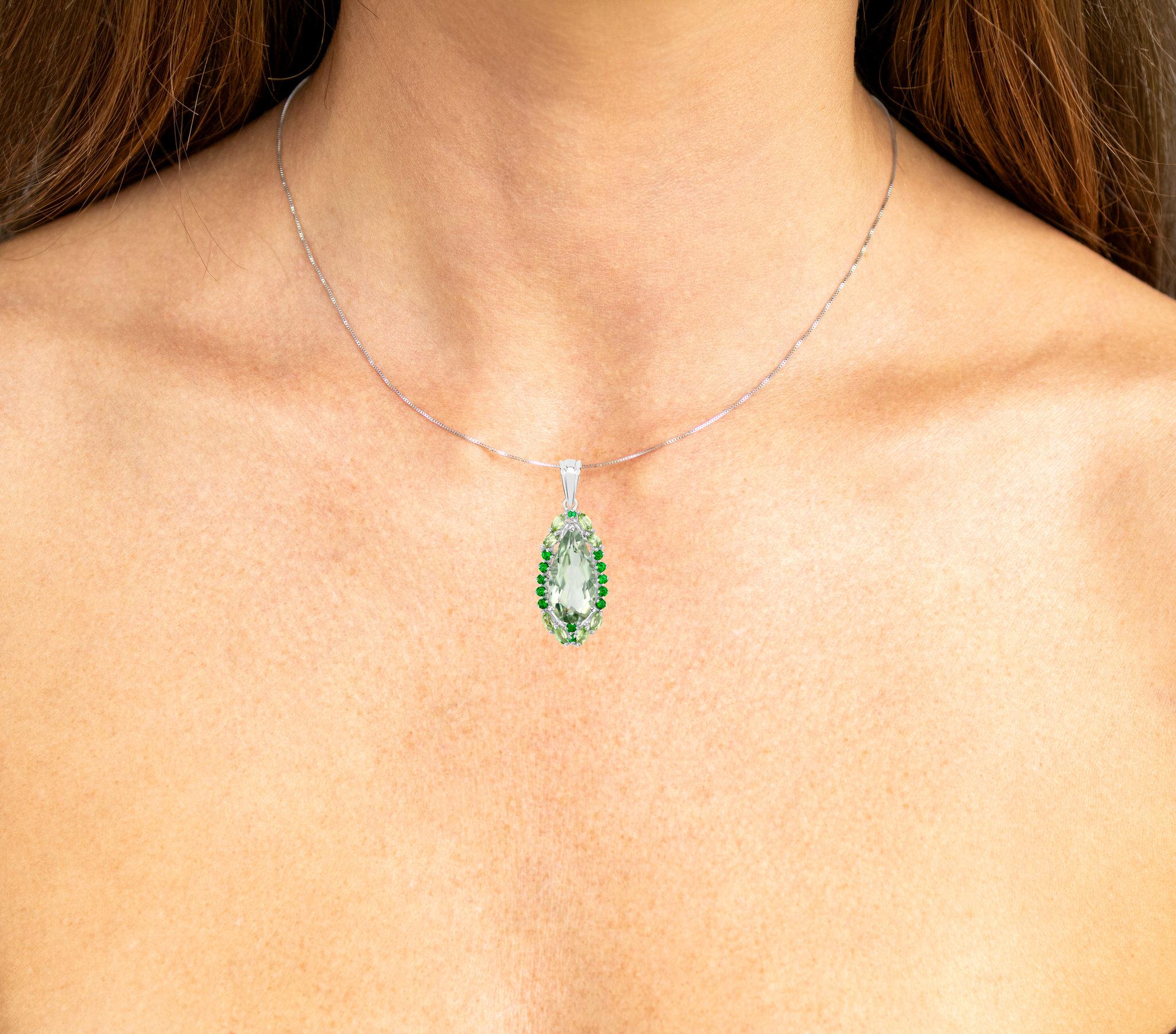 It comes with the Gemological Appraisal by GIA GG/AJP
All Gemstones are Natural
Green Amethyst = 4.45 Carats
8 Peridots = 0.58 Carats
13 Chrome Diopsides = 0.50 Carats
Metal: Rhodium Plated Sterling Silver
Pendant Dimensions: 36 x 15 mm
Jewelry Gift
