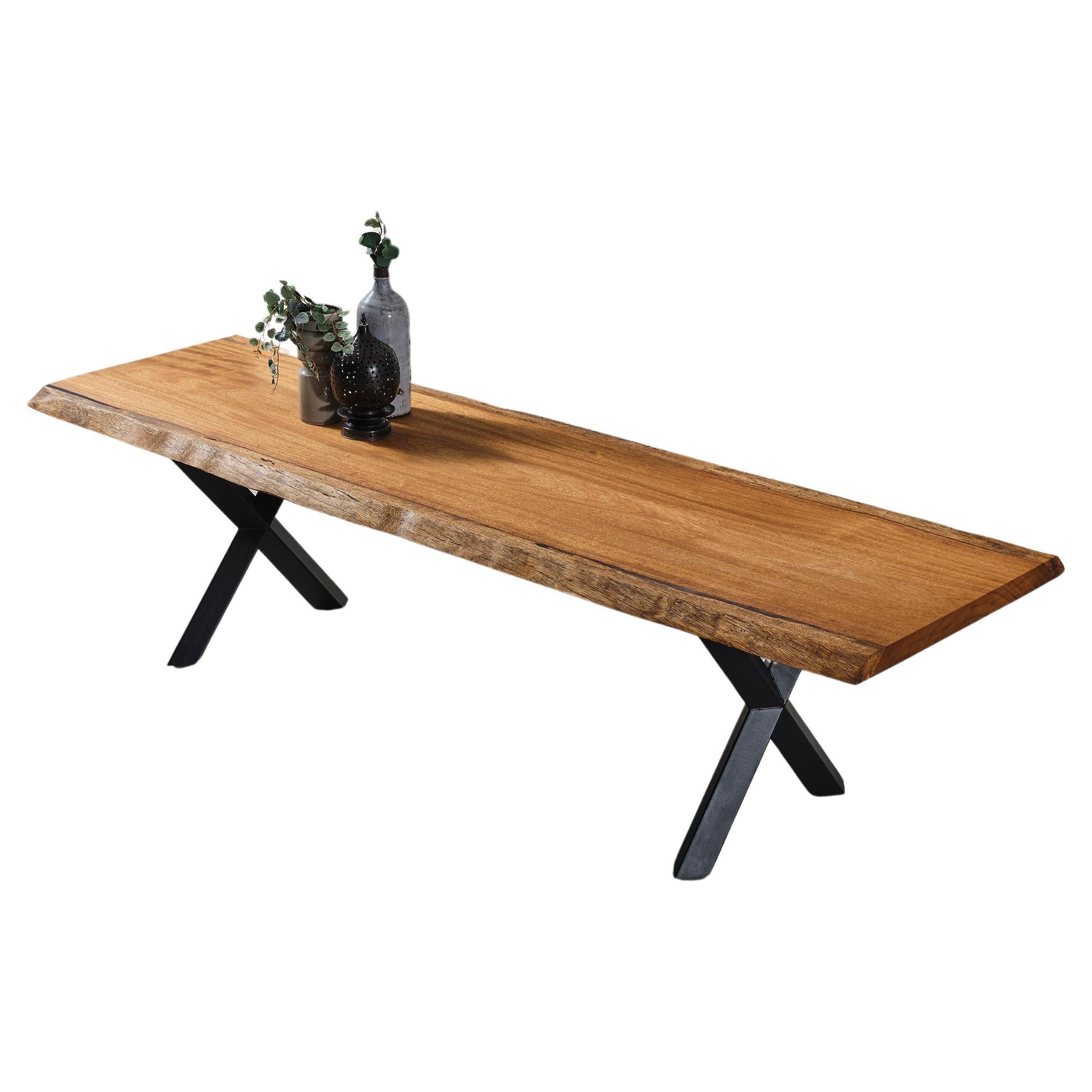 Custom Iroko Tropical Wood Live Edge Dining Table 

This table is made of Iroko Wood. The grains and texture of the wood describe what a natural Iroko woods looks like.
It can be used as a dining table or as a conference table. Suitable for indoor