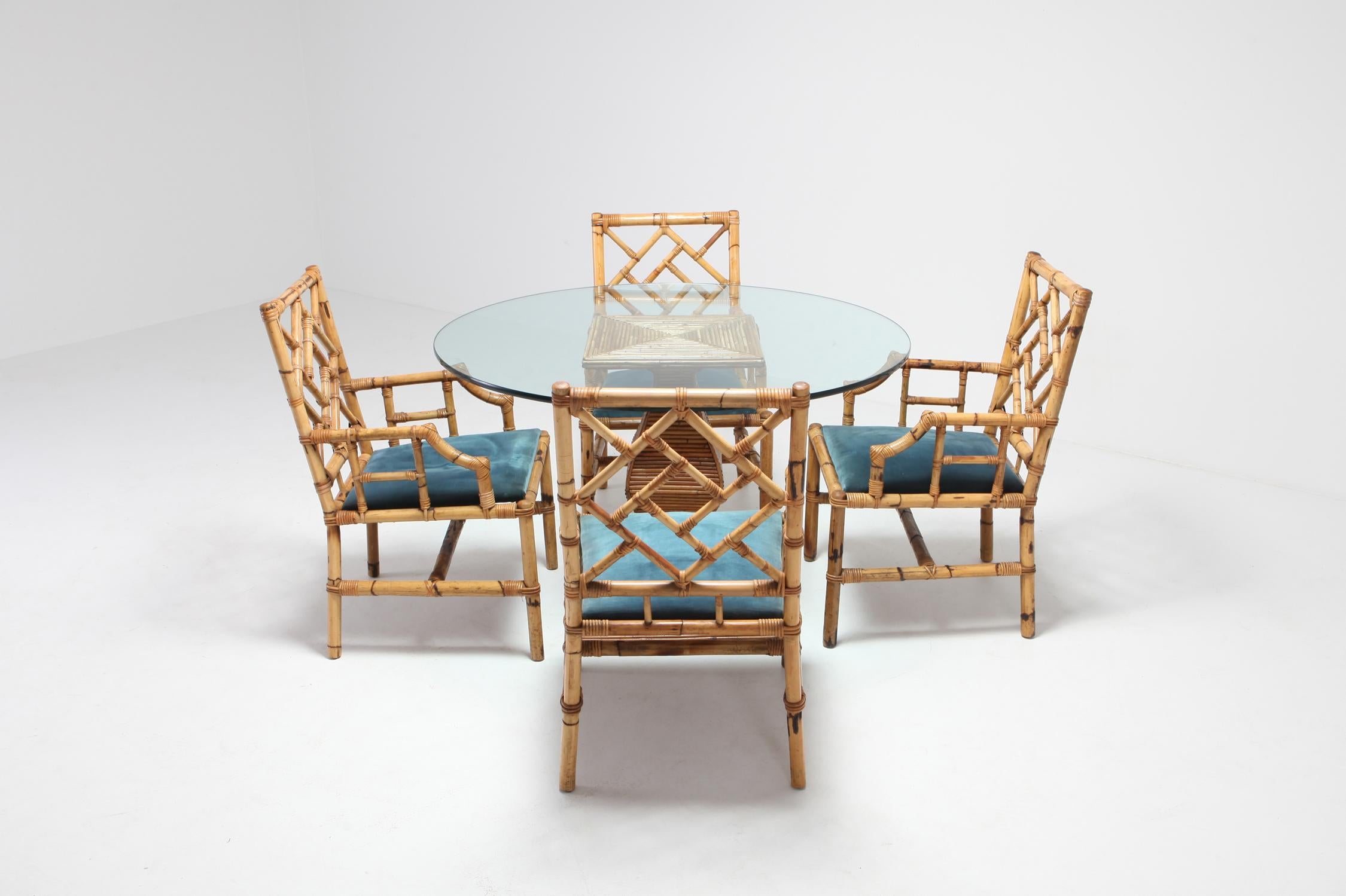 Gabriella Crespi style dining suite in bamboo by Vivai del Sud, Italy, 1970s. Great Italian glam piece that fits well in an eclectic Hollywood regency interior. 
The listing includes four chairs and one round dining table by Vival del Sud.
We've