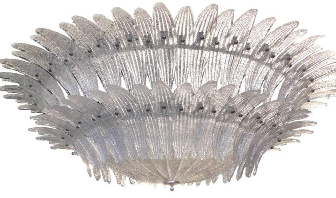 Italian two tier Palmette flush mount chandelier shown in clear Murano glass leaves with granular texture using Graniglia technique, mounted on satin nickel metal frame / Made in Italy
8 lights / E26 or E27 type / max 60W each 
Diameter: 48 inches /