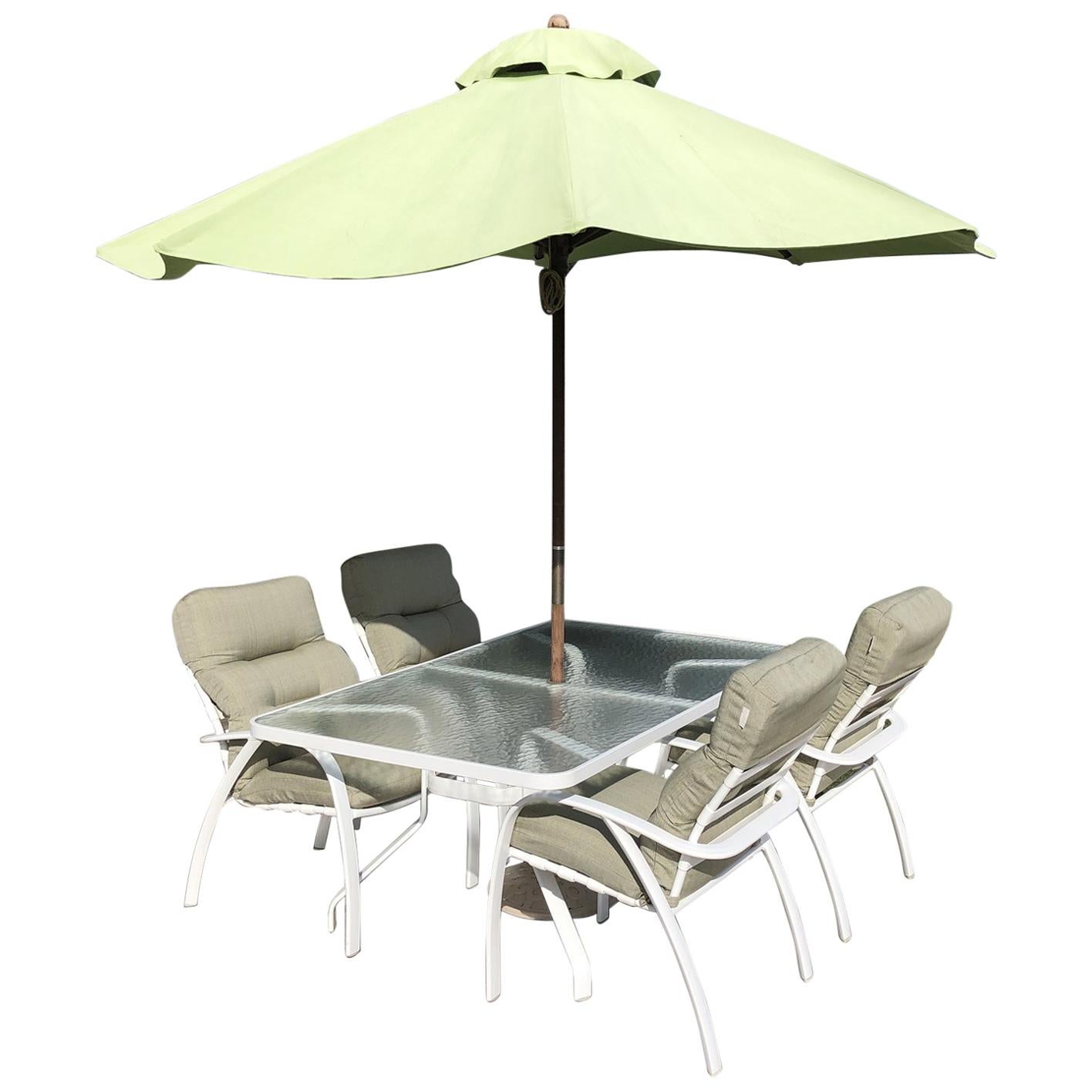 Tropitone Table, Four Chairs and Umbrella For Sale