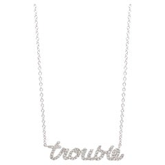 Trouble Neckace With 0.25 CT round diamonds. 