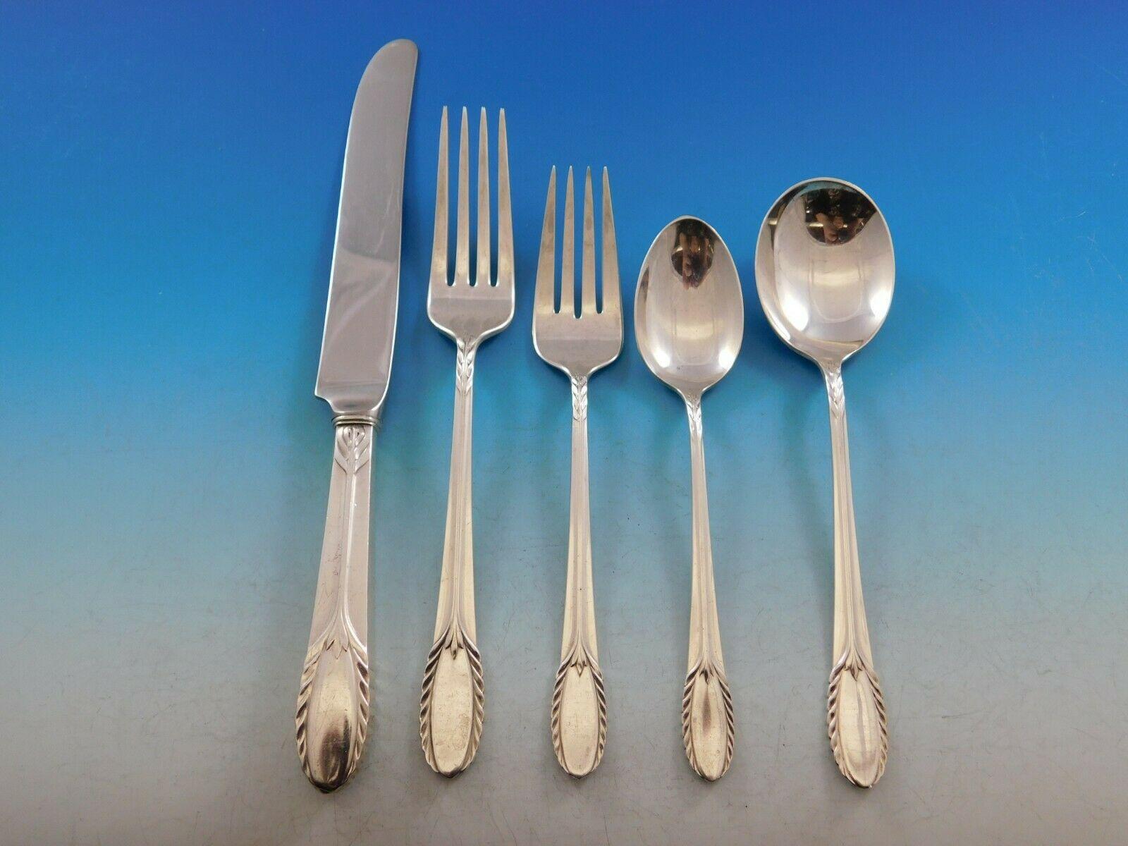 Trousseau by International Sterling silver flatware set - 45 pieces. This set includes:

 8 knives, 9 1/8