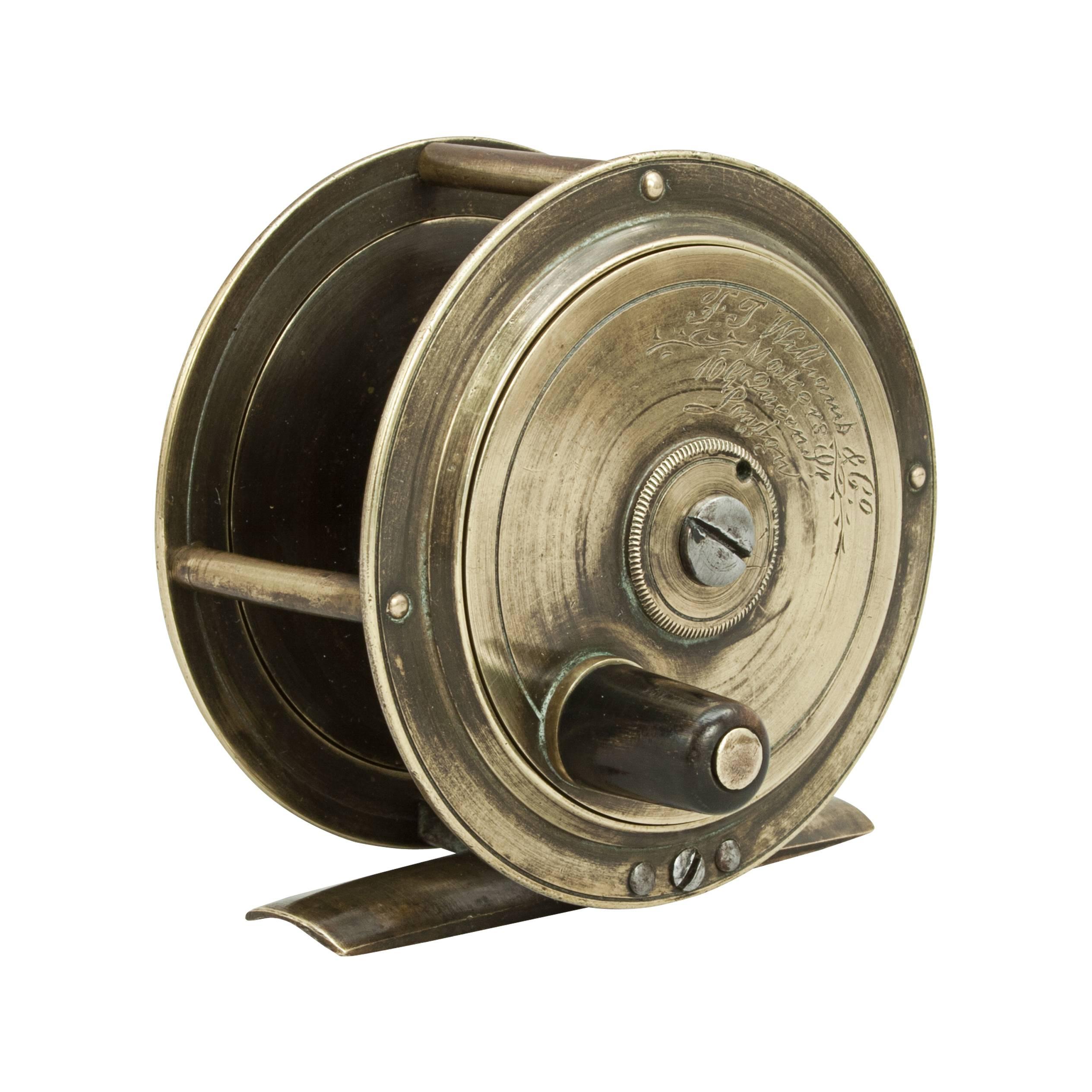 A fine trout fly fishing reel by F.J Williams of 109 Queen Street London. This is a nice quality reel with good quality engraving on the winding plate. ' F.J. Williams & Co. Makers, 109 Queen Street, London'.
   