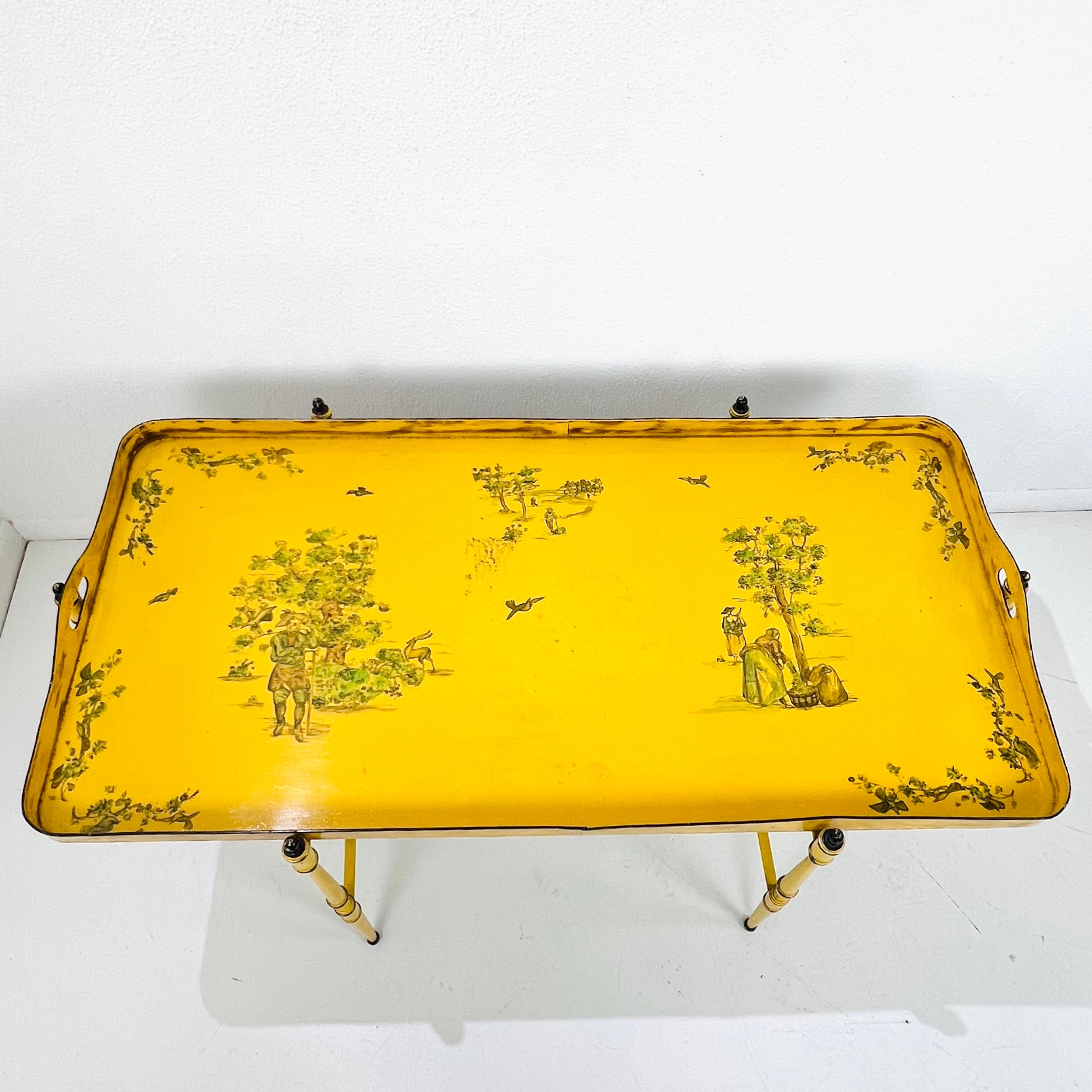 A beautifully executed mid-century piece by Trouvailles, this elegant tray-top table draws inspiration from classical Italian toleware. The generous rectangular top (49
