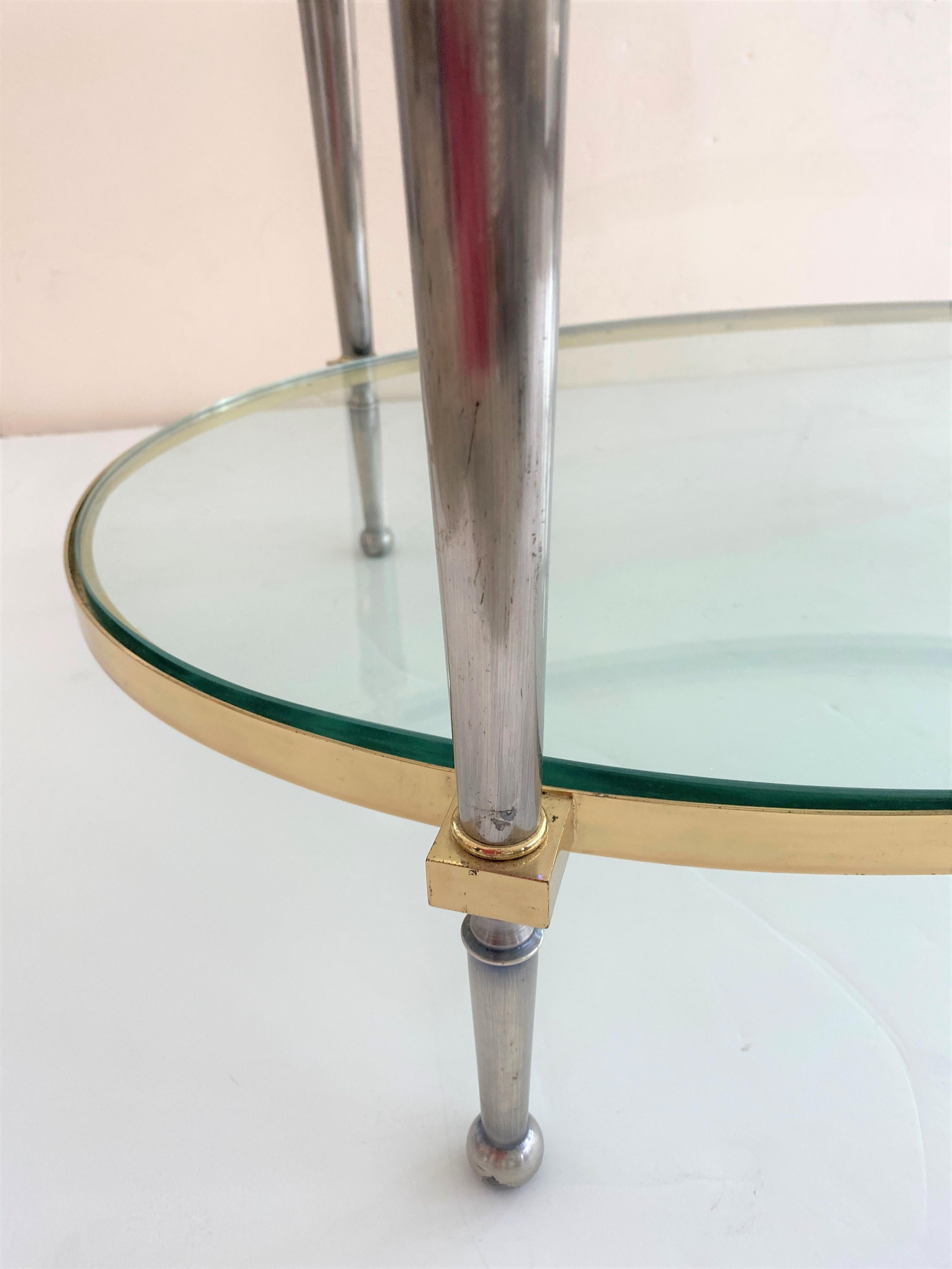 Polished Trouvailles Steel and Brass Oval Cocktail Table