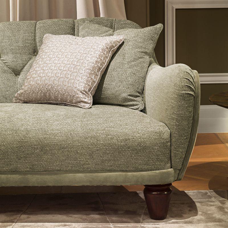 Elegant and stylish with an extraordinary tufted back, this splendid sofa will take center stage in a refined interior of any style inspiration. Upholstered with chenille fabric on the inside, contrasting with a suede back. It includes two pillows.