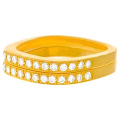 Trudel paire d'anneaux modernes suisses en or sertis de diamants