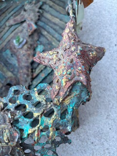 Cesta de metal Trudi Gilliam cortada con soplete y soldada con tema marino