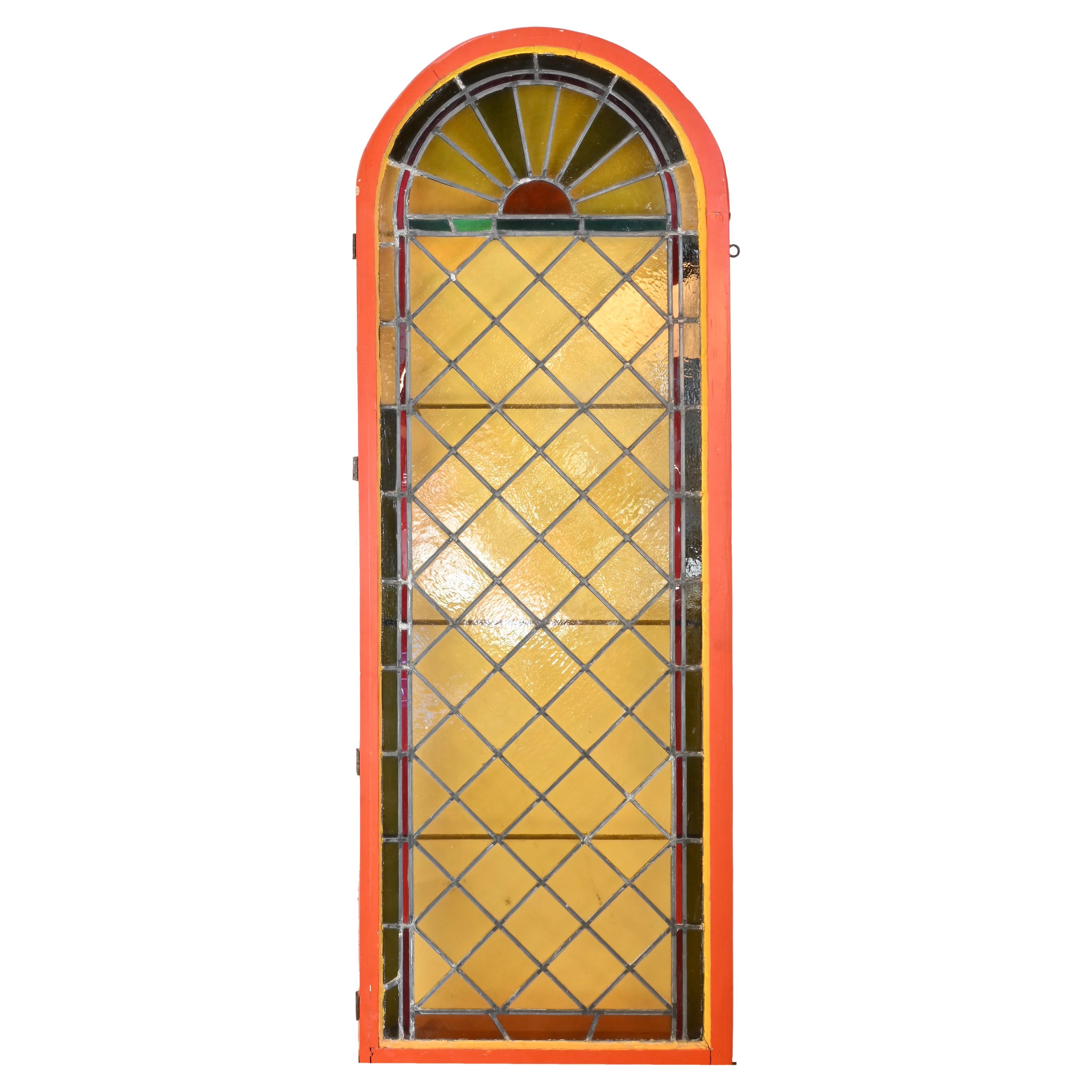 True Arch Topped Stained Glass Window with Sunburst For Sale