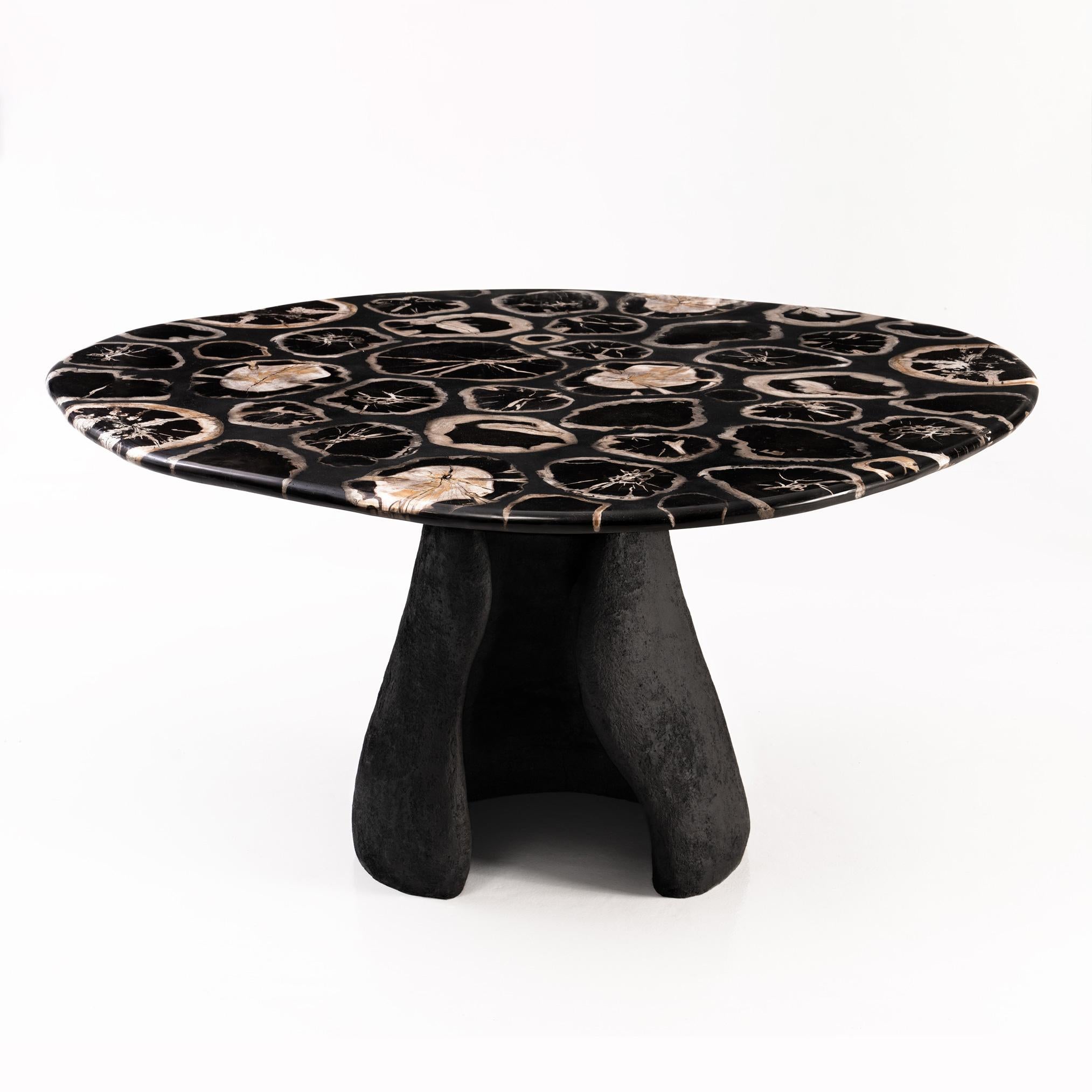 True Grit Dining Table by Odditi
Unique and Numbered
Dimensions: W 150 x D 146 x H 75 cm
Materials: Petrified Wood, Lava Stone, Granite

'True Grit’ is a perfectly imperfect sculptural dining table, featuring curated and artfully arranged, rare raw