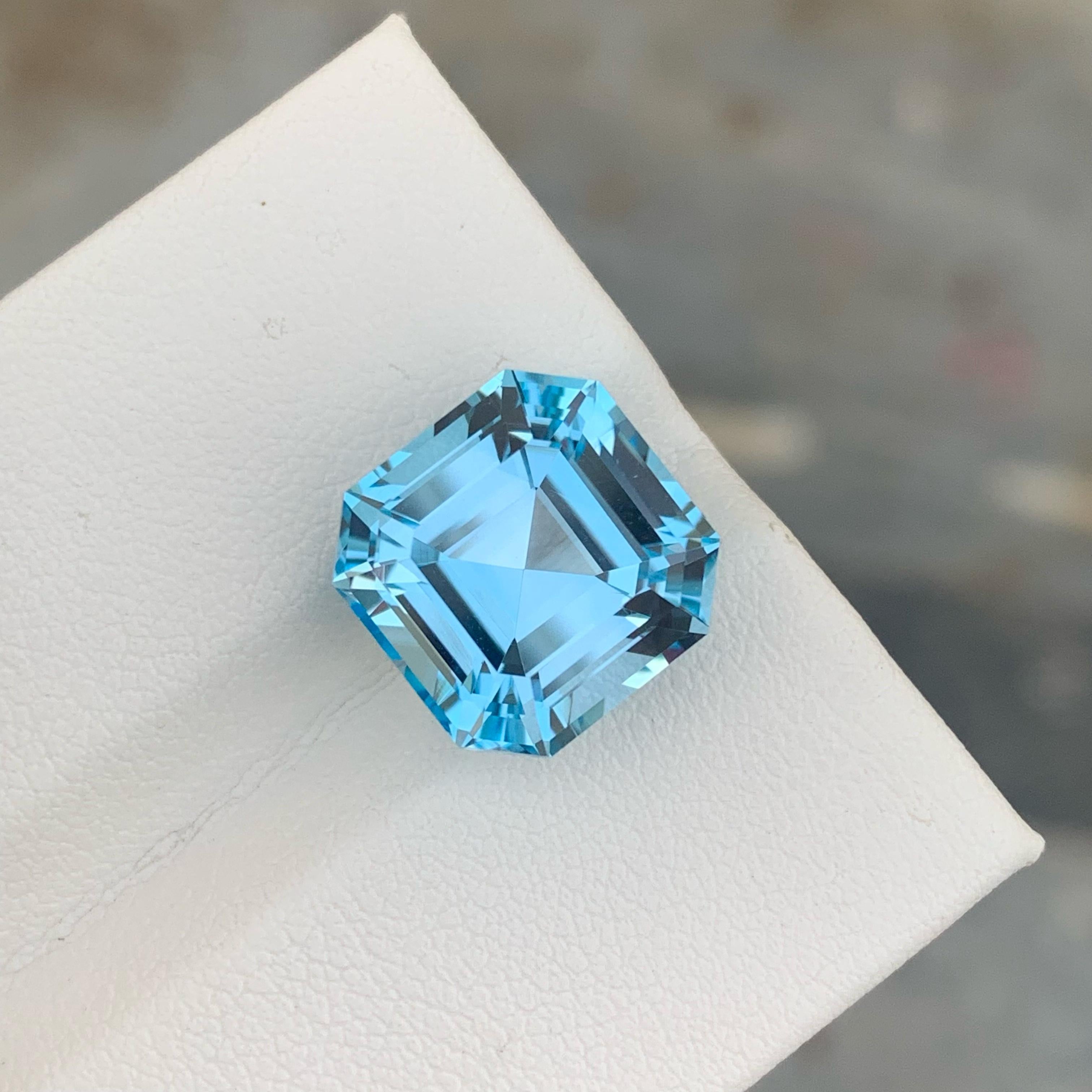 Modern True Luxury Swiss Blue Topaz 12.80 carats Asscher Cut Natural Madagascar's Gem For Sale