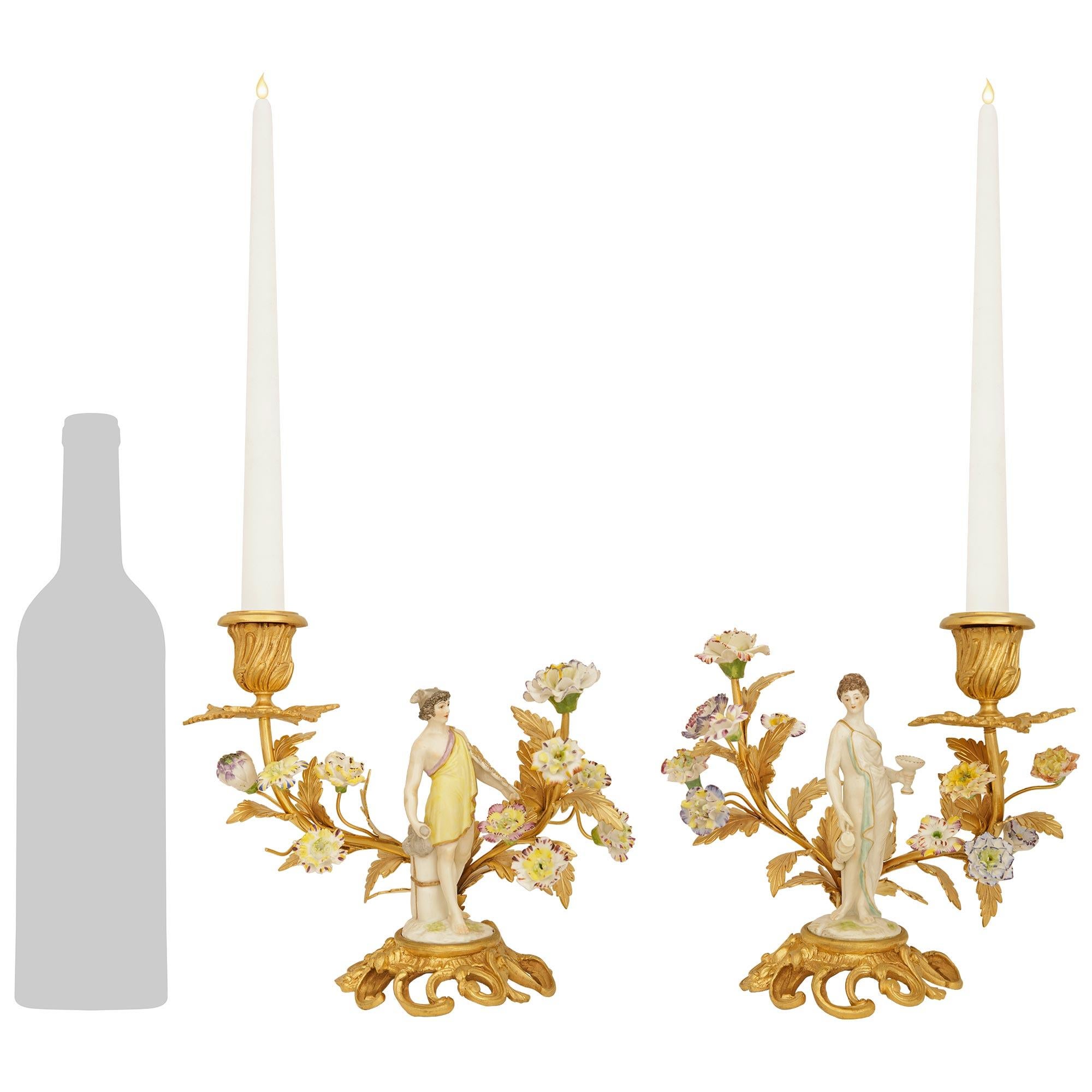 true pair of 19th century Louis XV st. Porcelain and Ormolu candlesticks In Good Condition For Sale In West Palm Beach, FL
