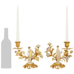 true pair of 19th century Louis XV st. Porcelain and Ormolu candlesticks