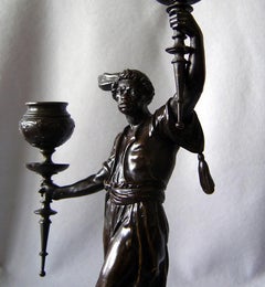 True pair of candelabra in patinated bronze, French late 19th century