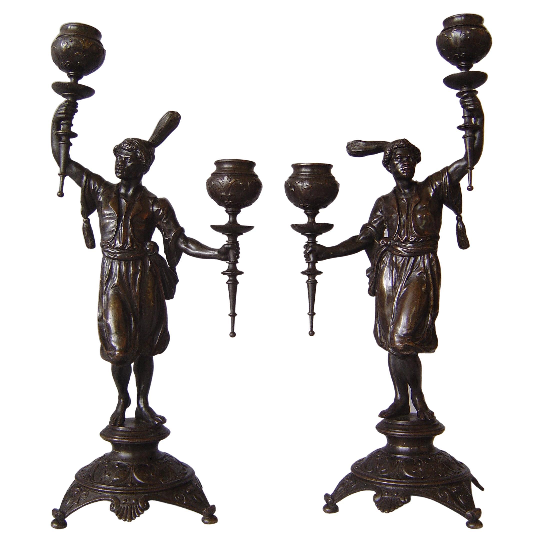 True pair of candelabra in patinated bronze, French late 19th century For Sale