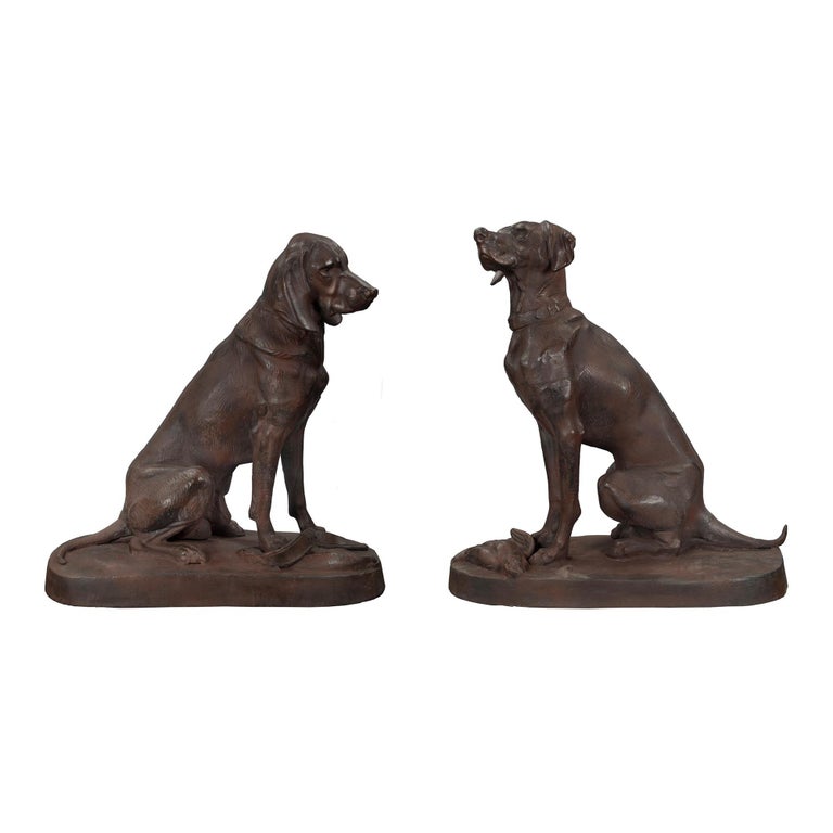 True Pair of Continental 19th Century Cast Iron Statues of Two Dogs For Sale at 1stdibs