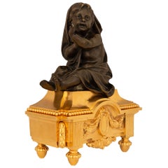 True Pair Of French 19th c. Louis XVI St. Ormolu & Patinated Bronze Andirons